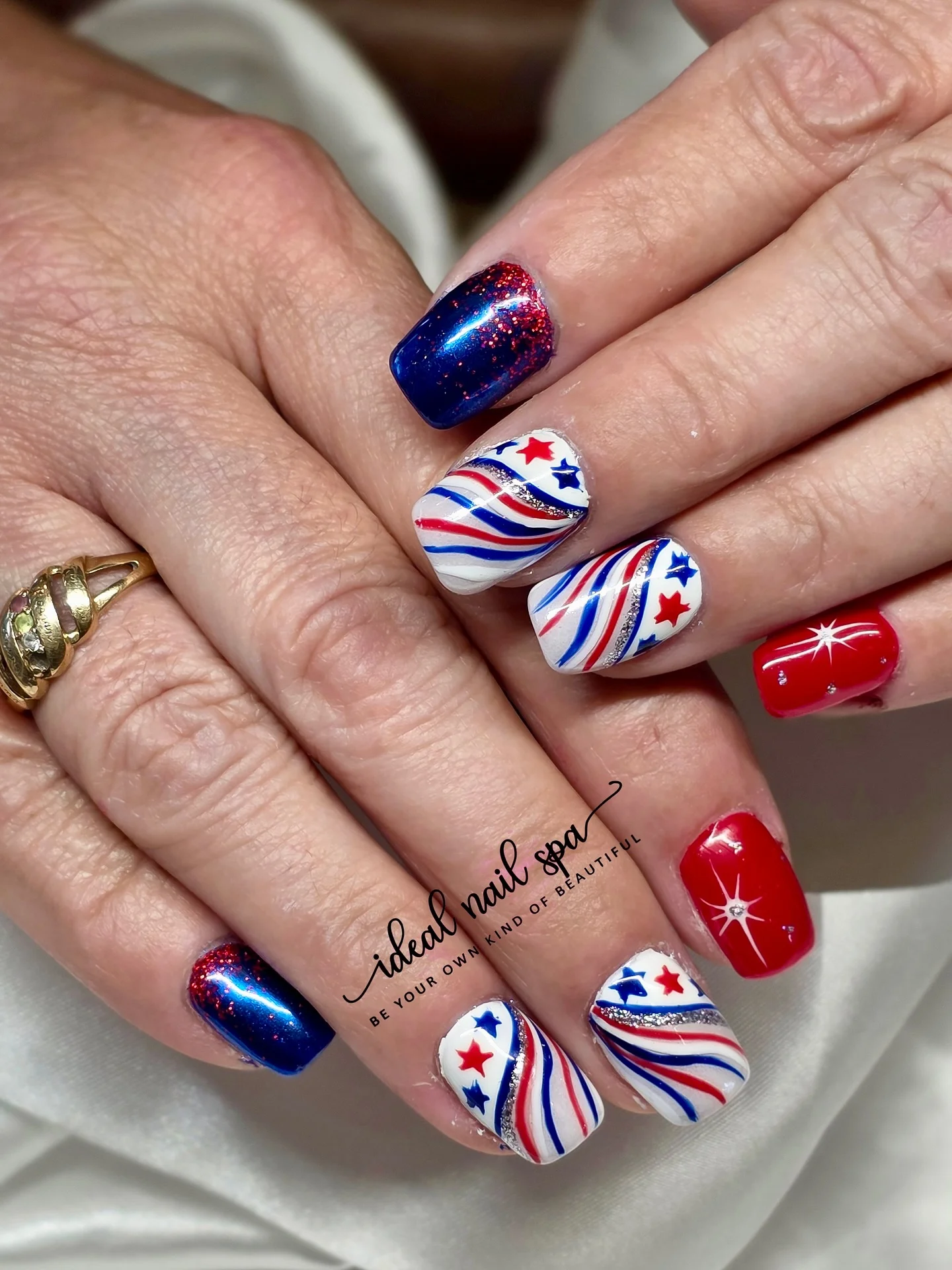 4th of july nails 2026 Classic Firework Swirl Nails With Glossy Red Accents