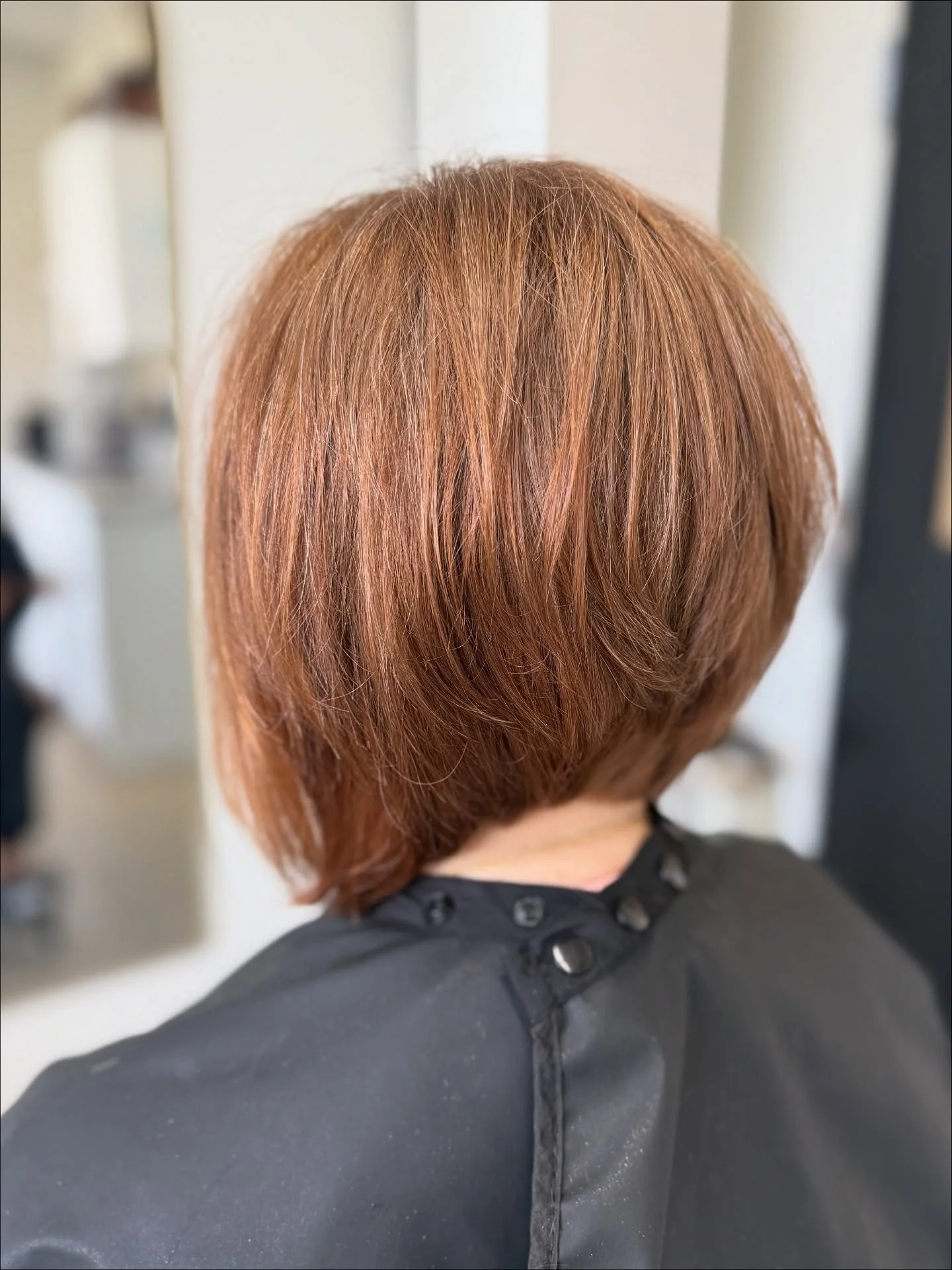 angled summer bob haircut 2026 Warm Copper Angled Bob With Soft Summer Texture