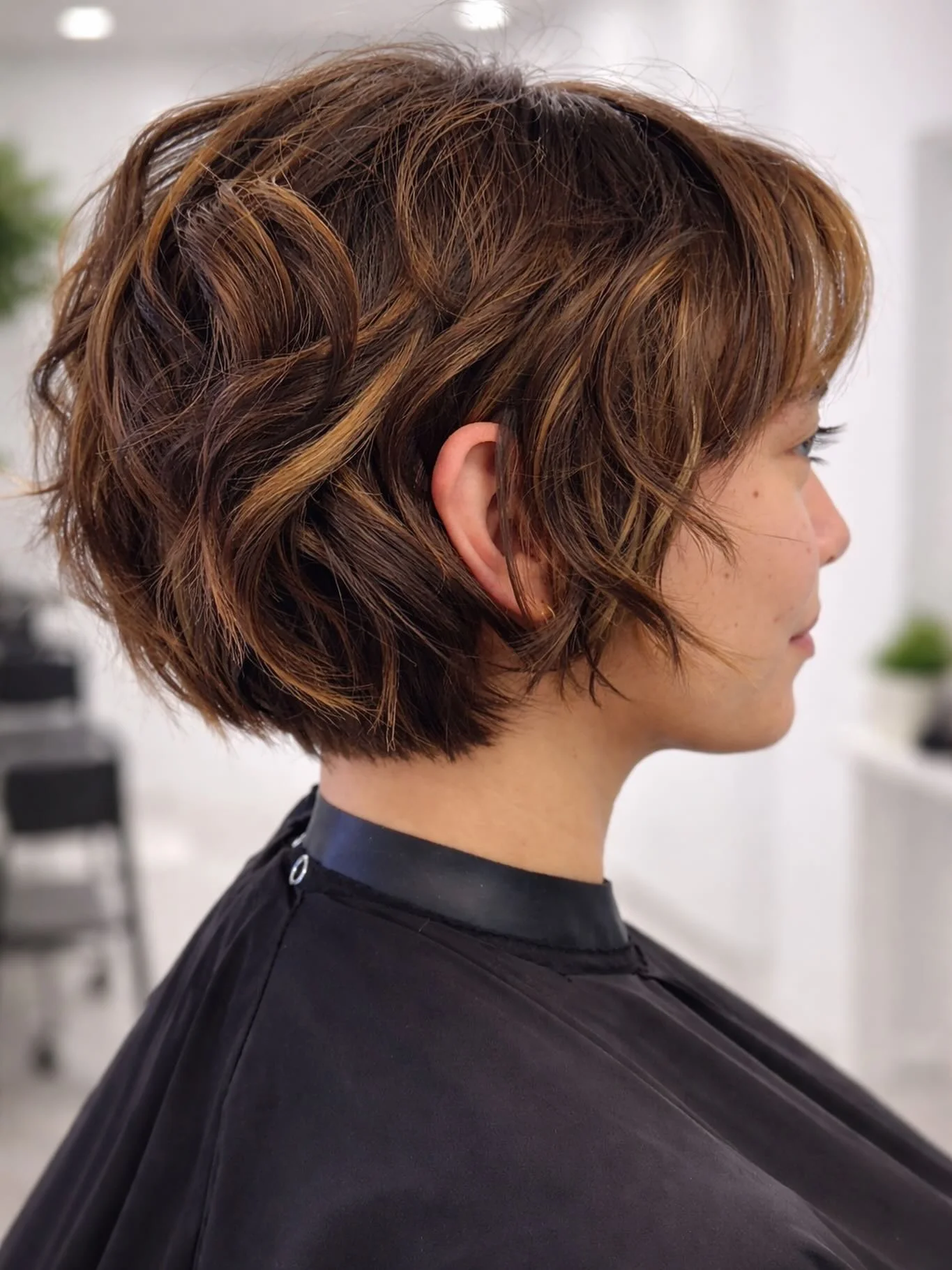 best summer short hairstyles 2026 French-Inspired Textured Bob With Wispy Bangs