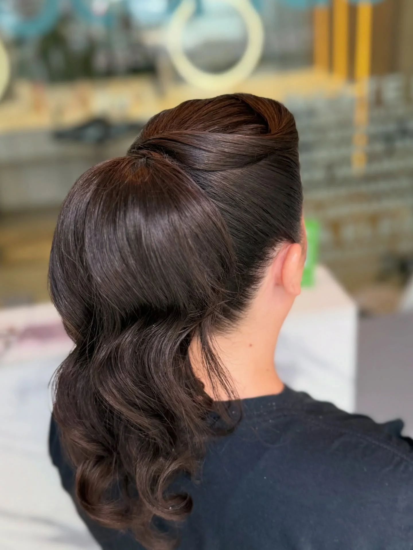 polished summer ponytail hairstyle 2026 Vintage-Inspired Brunette Ponytail With Sculpted Crown Volume