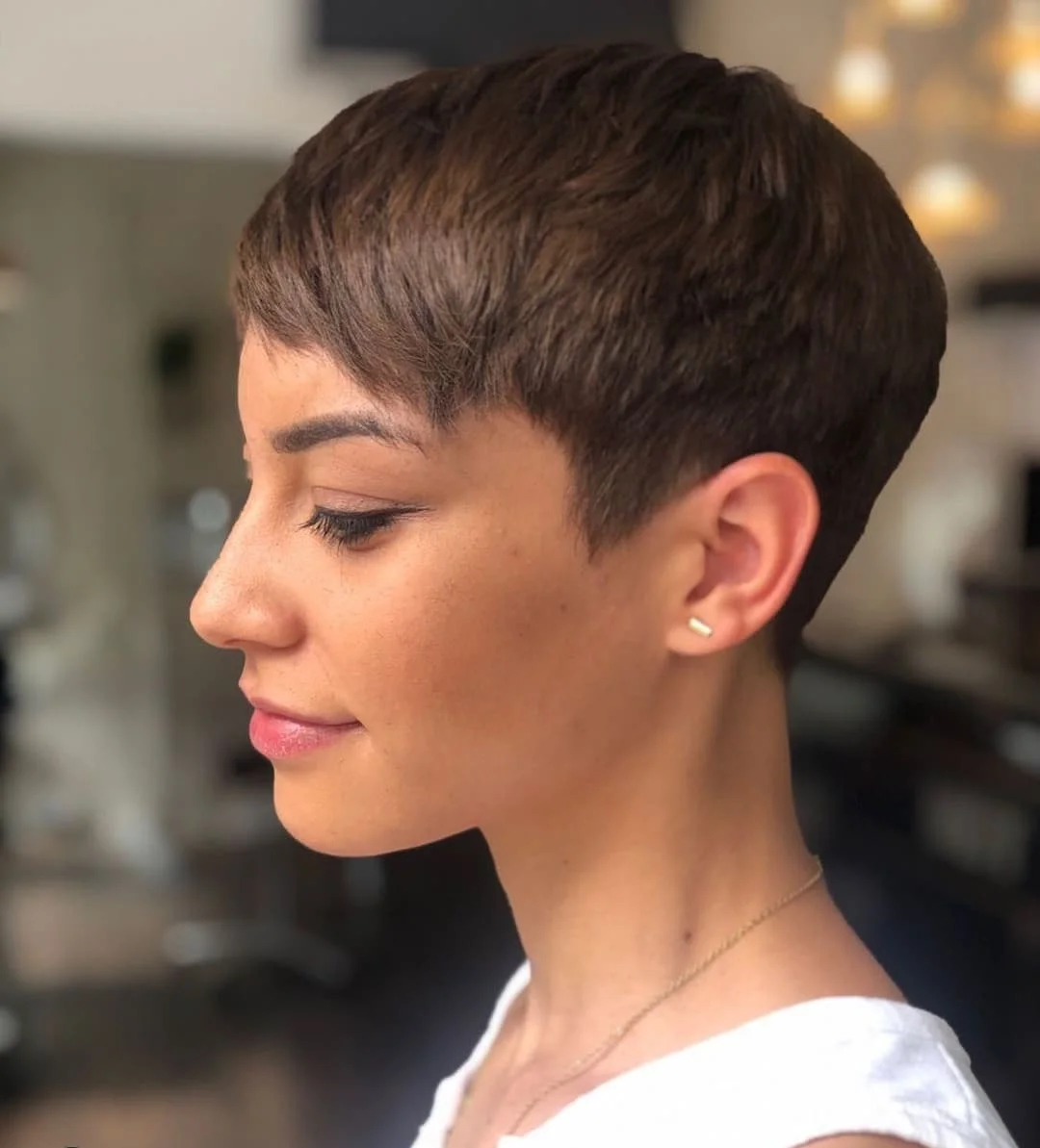 sleek summer short haircuts 2026 Soft Layered Crop With Natural Bang Movement