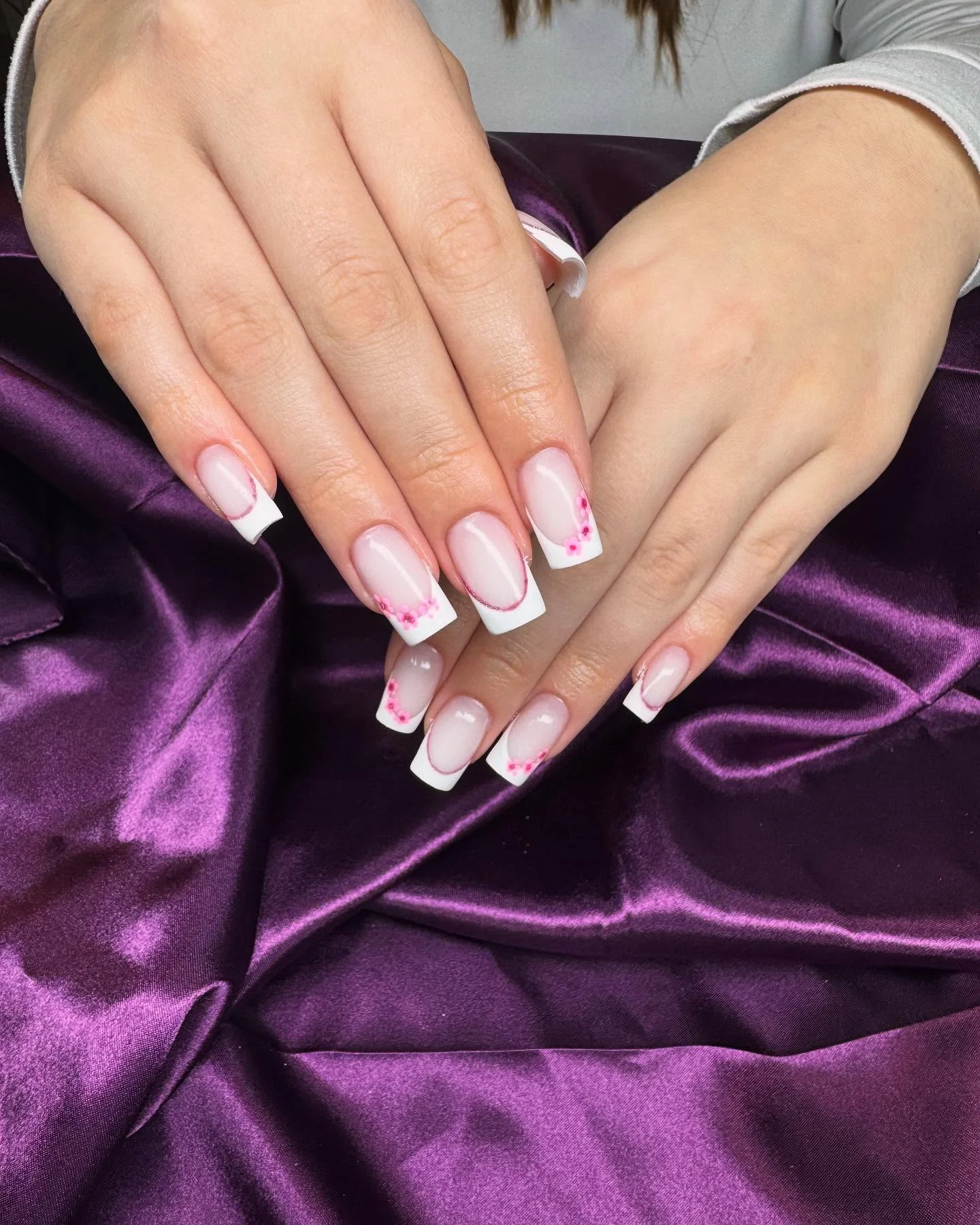 summer flower nails 2026 Romantic French Tip Florals With Tiny Pink Blossoms