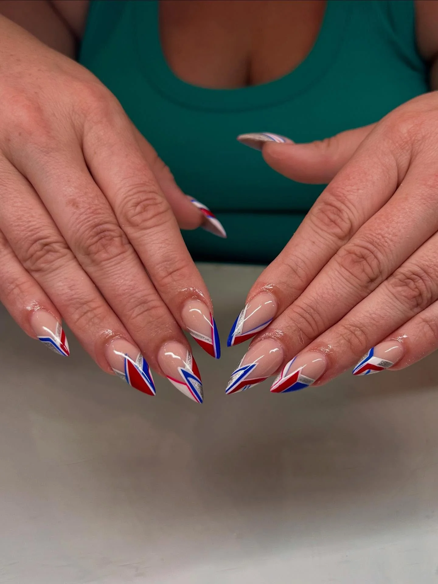 usa nails 2026 Graphic Almond French Tips With Modern Americana Lines