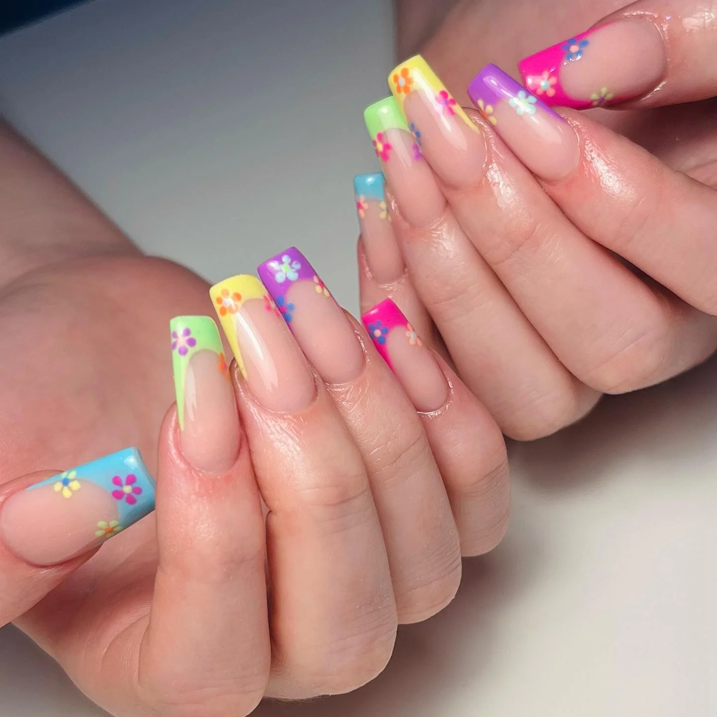 bright summer nails 2026 Rainbow Daisy French Tips With A Playful Y2K Twist