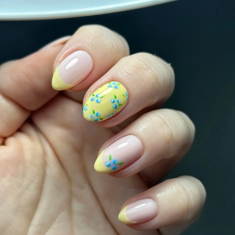 light summer nails 2026 Lemon Sorbet French Tips With Tiny Blue Florals