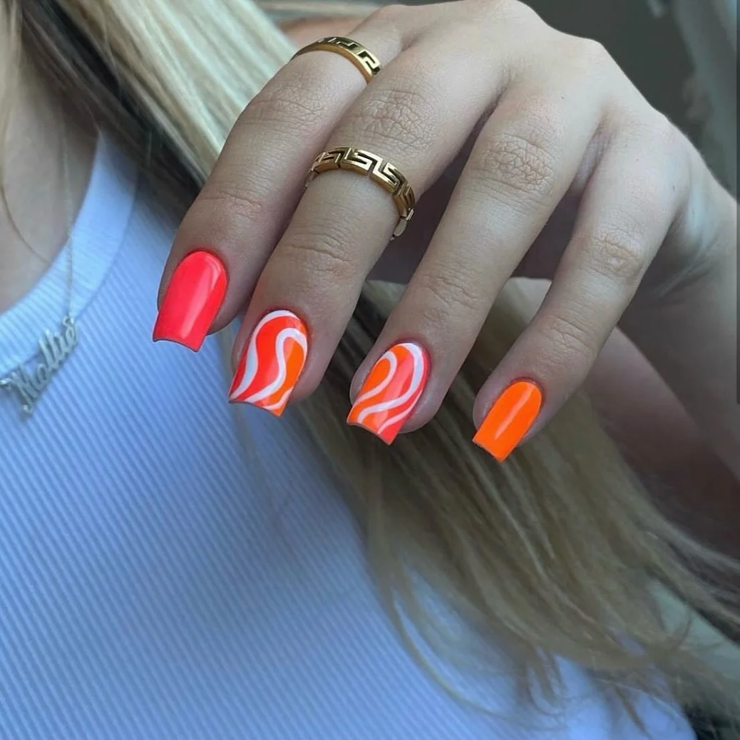 neon summer nails 2026 Sunset Orange Swirl Nails With Glossy Retro Energy