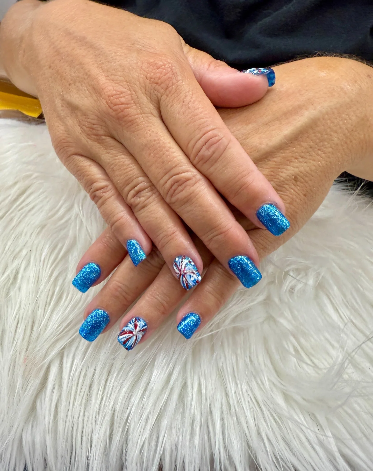 patriotic nails 2026 Electric Blue Glitter Nails With Firework Swirl Accents