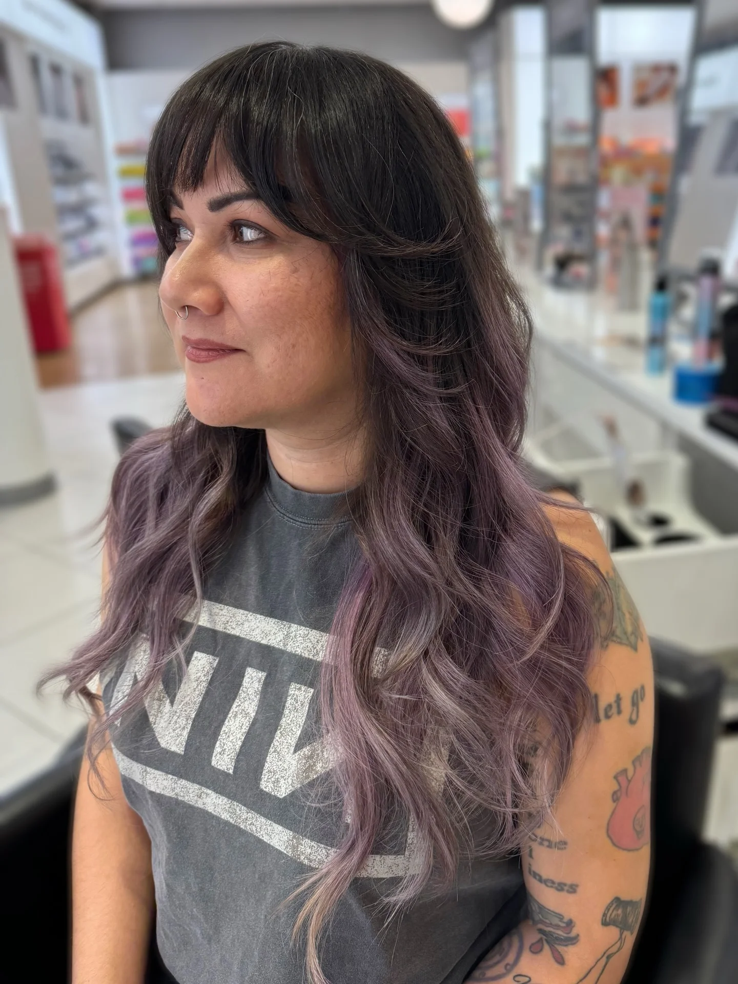 perfect summer haircut 2026 Shaggy Layers With Soft Bangs And Dusty Lavender Tone