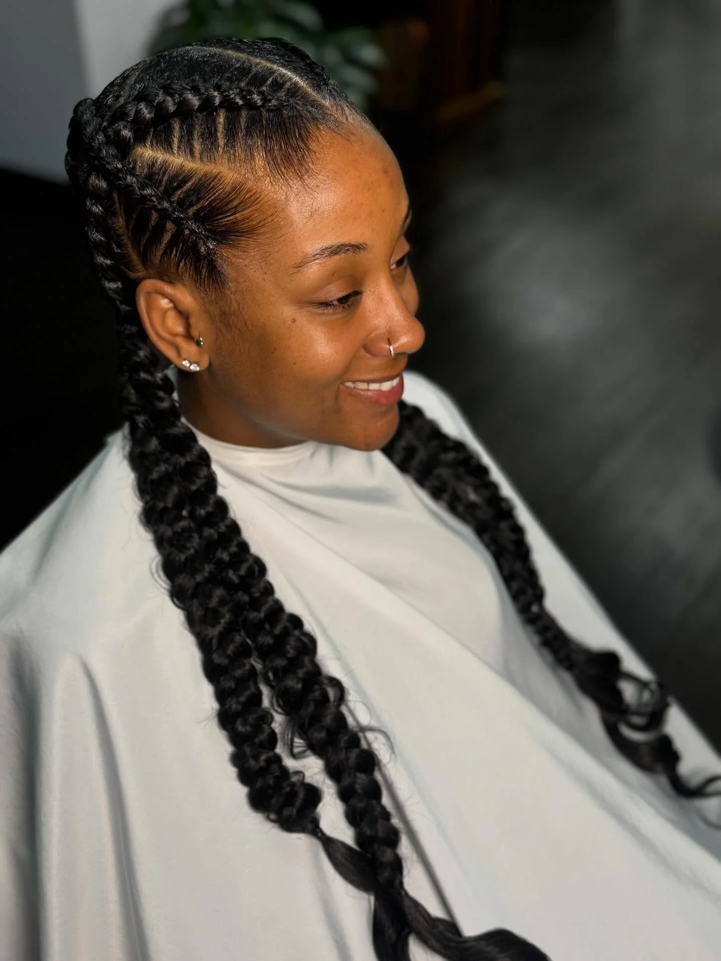 regal summer hairstyle black women 2026 Chunky Crown Braids With Soft Curled Ends