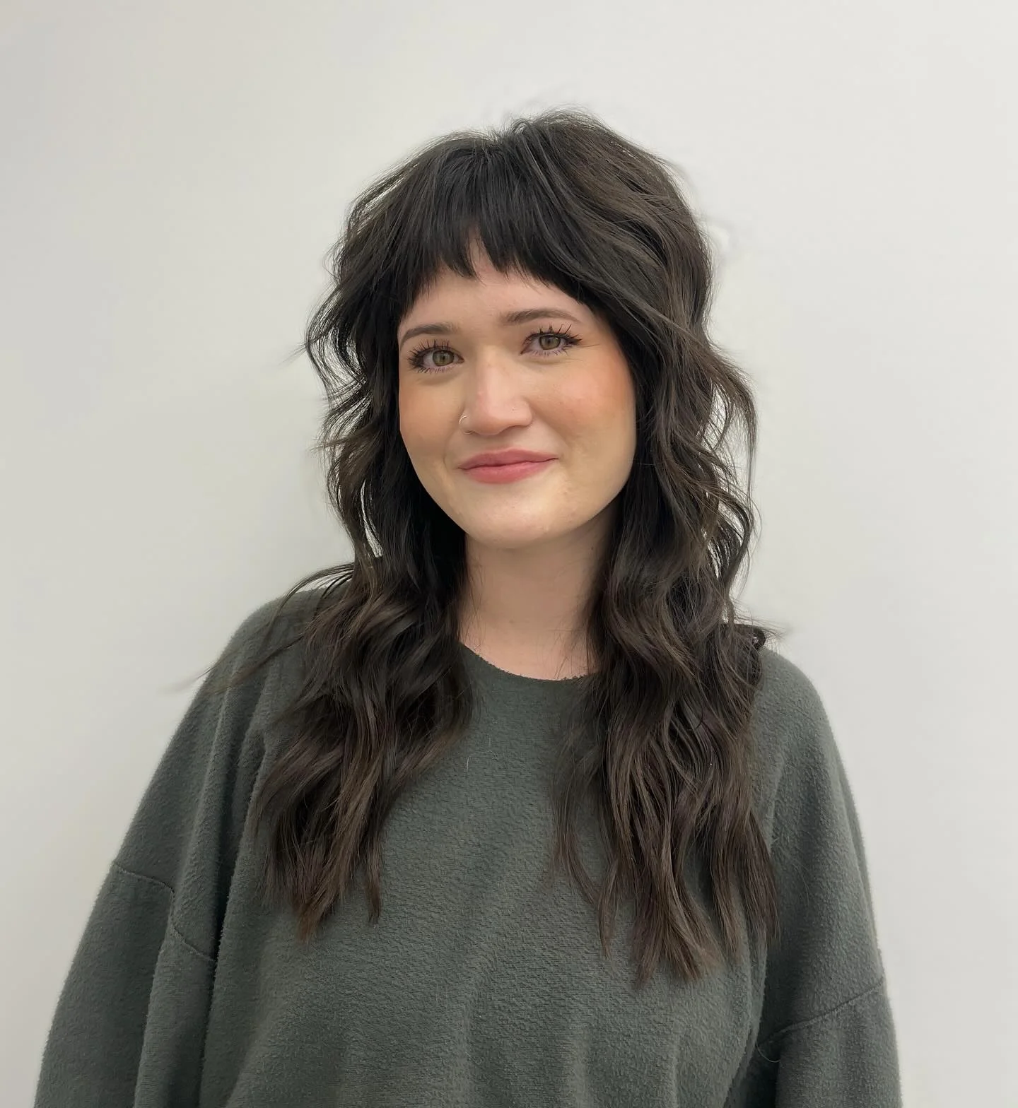 sophisticated summer haircuts for women over 40 2026 Airy Long Shag With Soft Micro Bangs