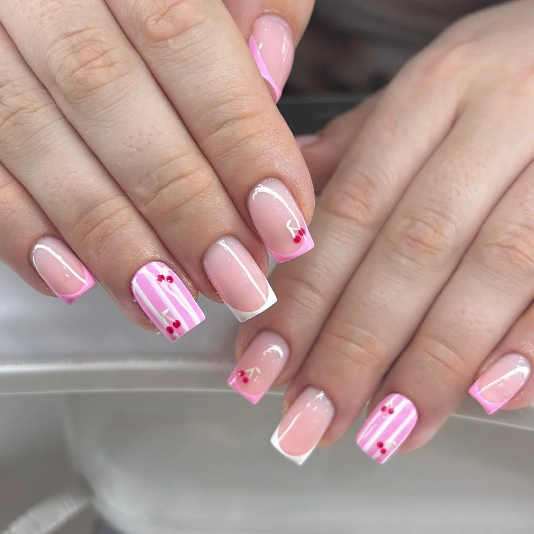 summer nail art 2026 Cherry French Tips With Soft Pink Gloss
