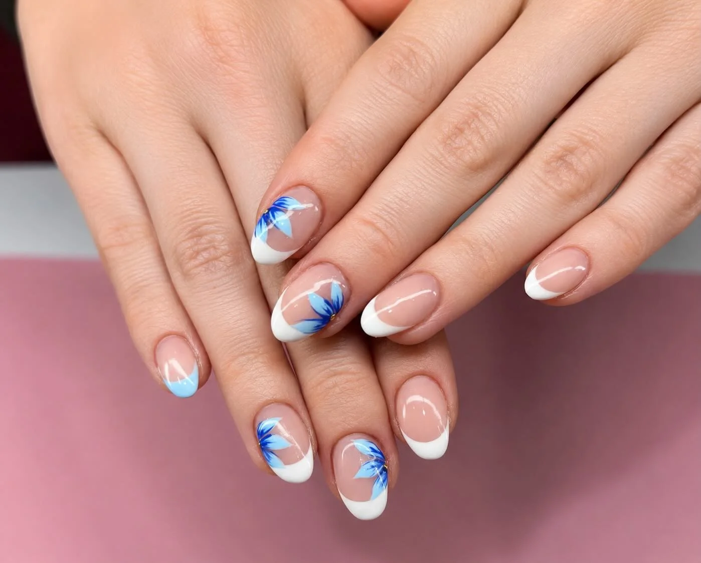 summer nail inspo 2026 Blue Floral French Tips With Soft Coastal Energy