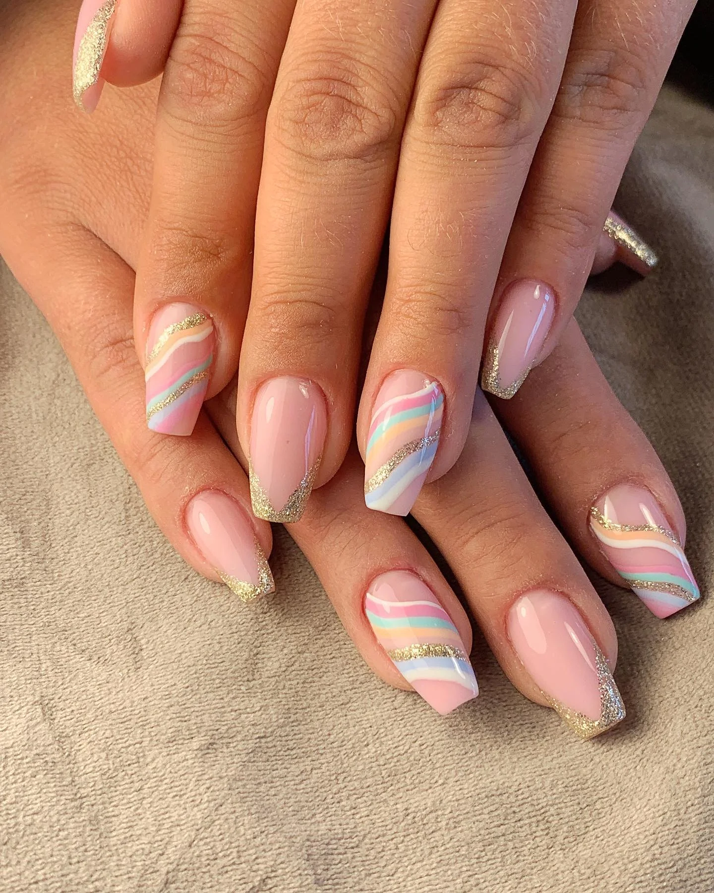 summer nails ballerina shape 2026 Pastel Rainbow French Tips With Soft Gold Accents