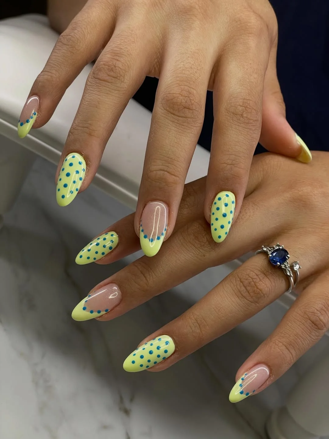 summer yellow nails 2026 Pastel Yellow Polka Dot Almond Nails With Blue Accents
