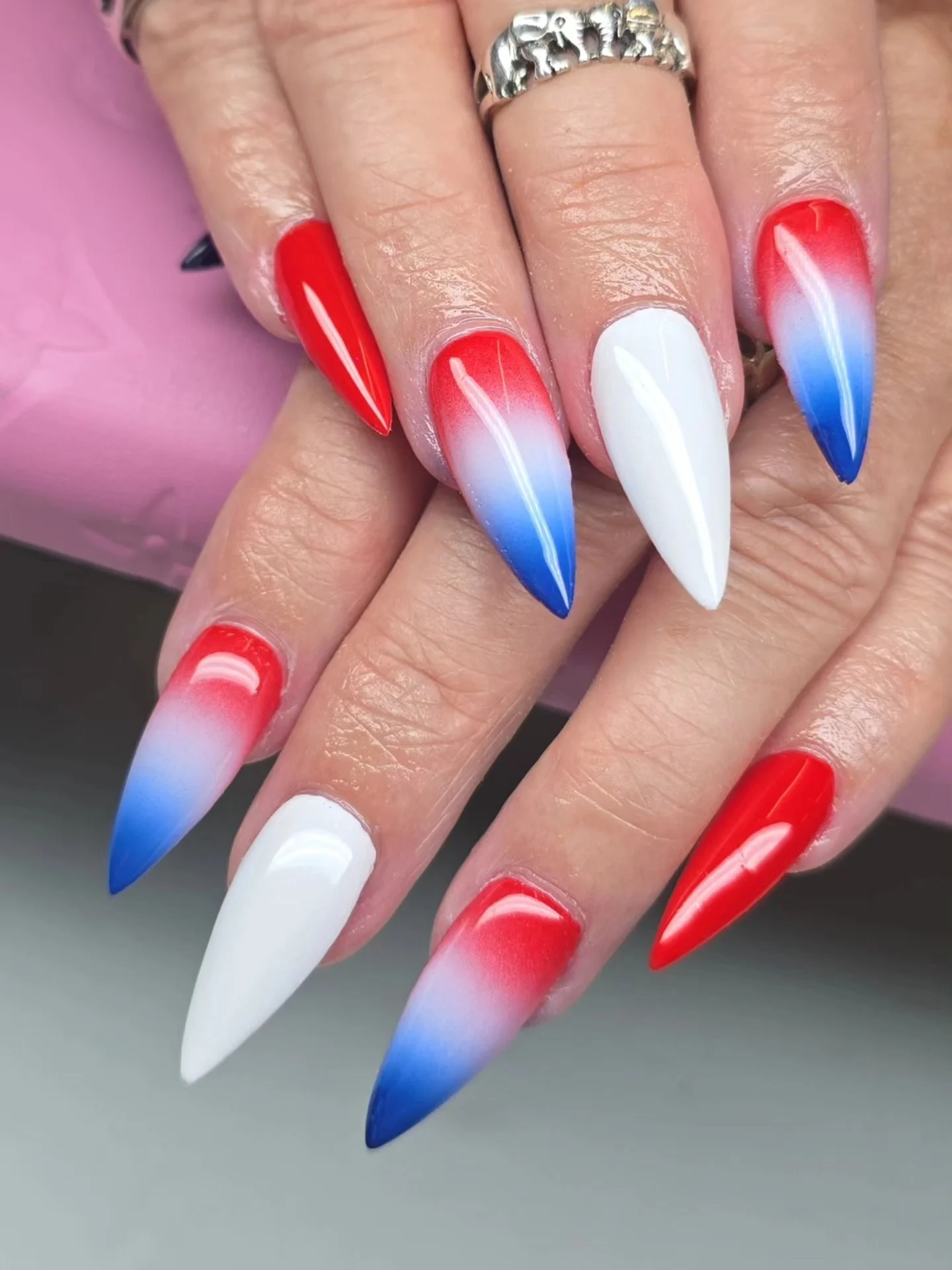 usa nails 2026 Glossy Ombre Stiletto Nails In Red White And Blue