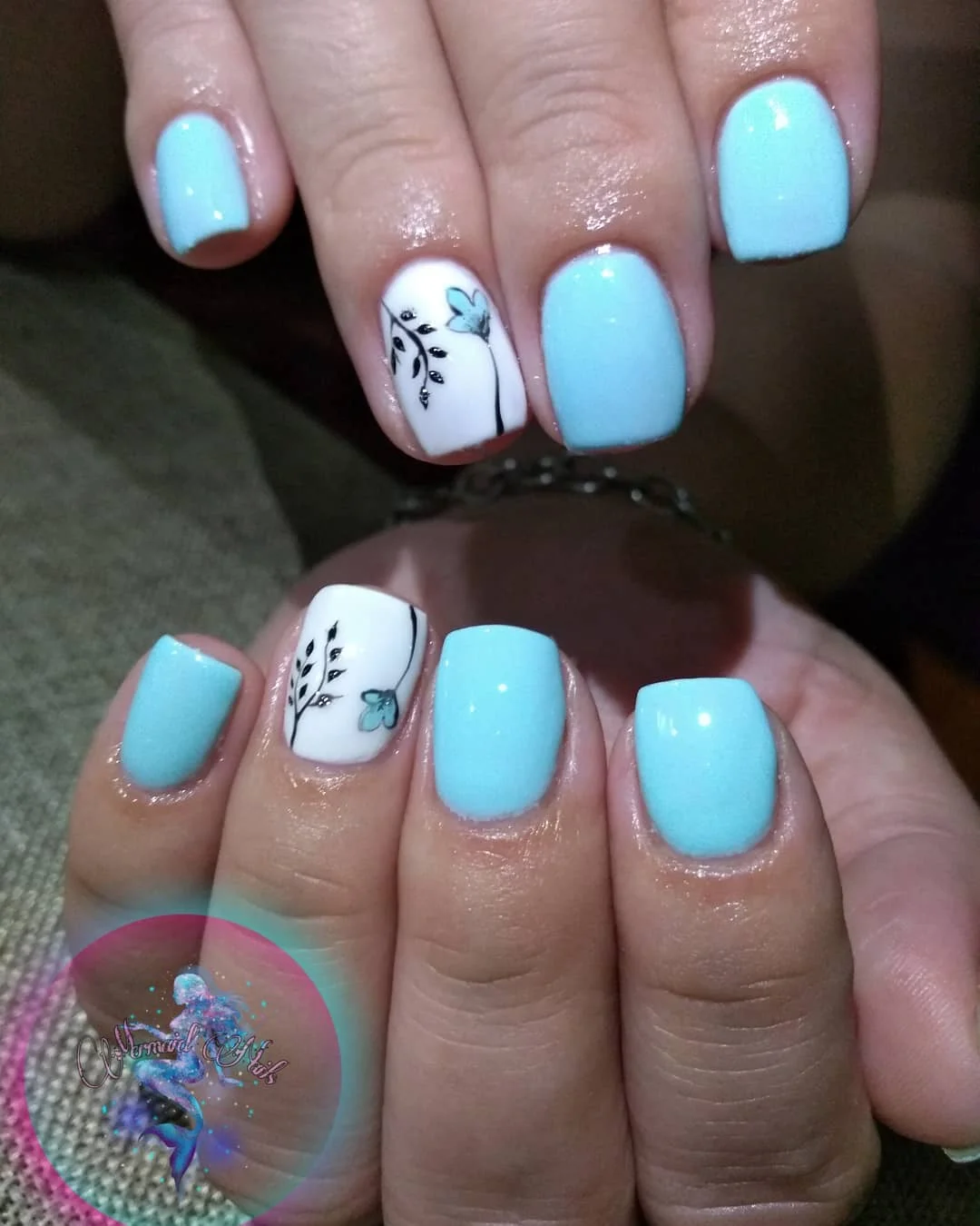 light blue summer nails Minimal Sky Blue Nails With Tiny Botanical Accents