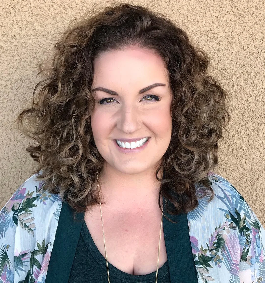 salon summer haircuts for plus size women 2026 Voluminous Curly Mid Length With Rounded Shape