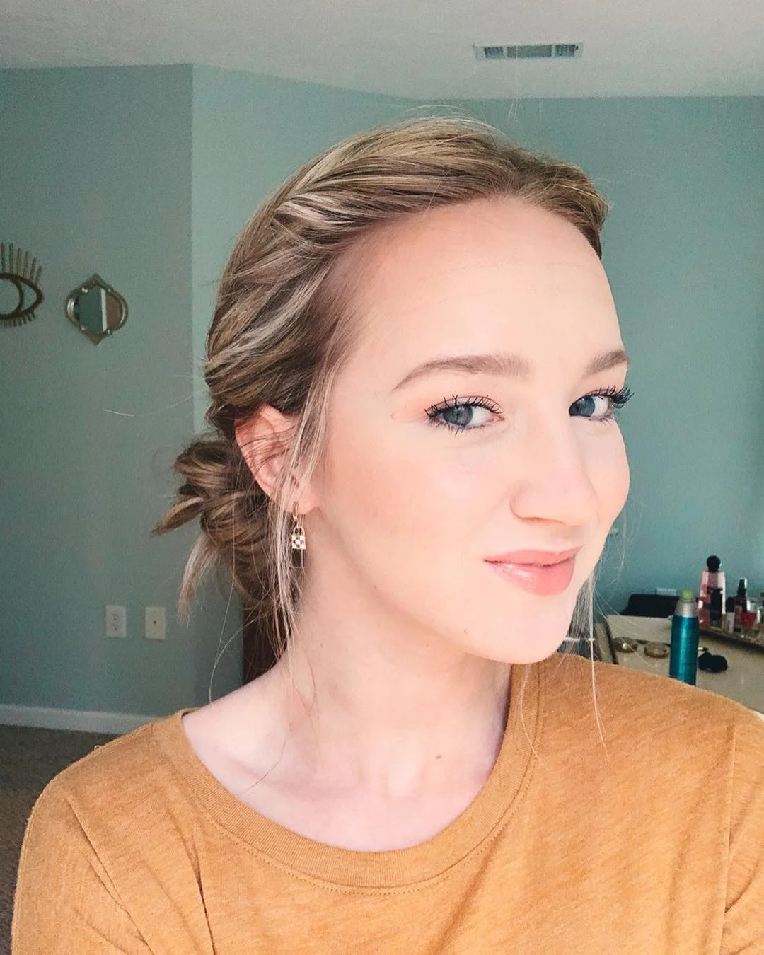 minimal summer easy hairstyle 2026 Undone Braided Twist Bun For Everyday Summer Makeup Days