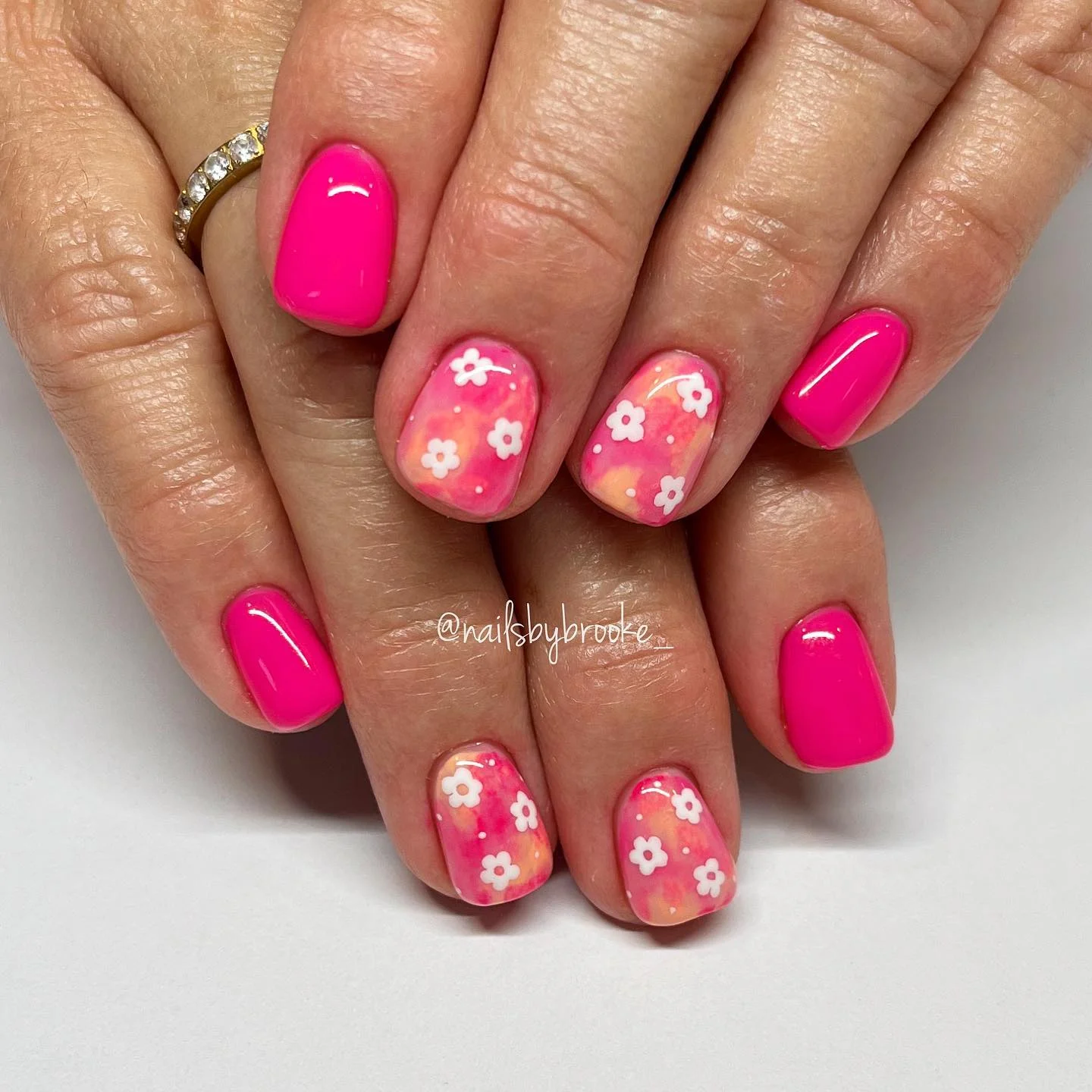pink summer nails 2026 Neon Pink Daisy Nails With Watercolor Details