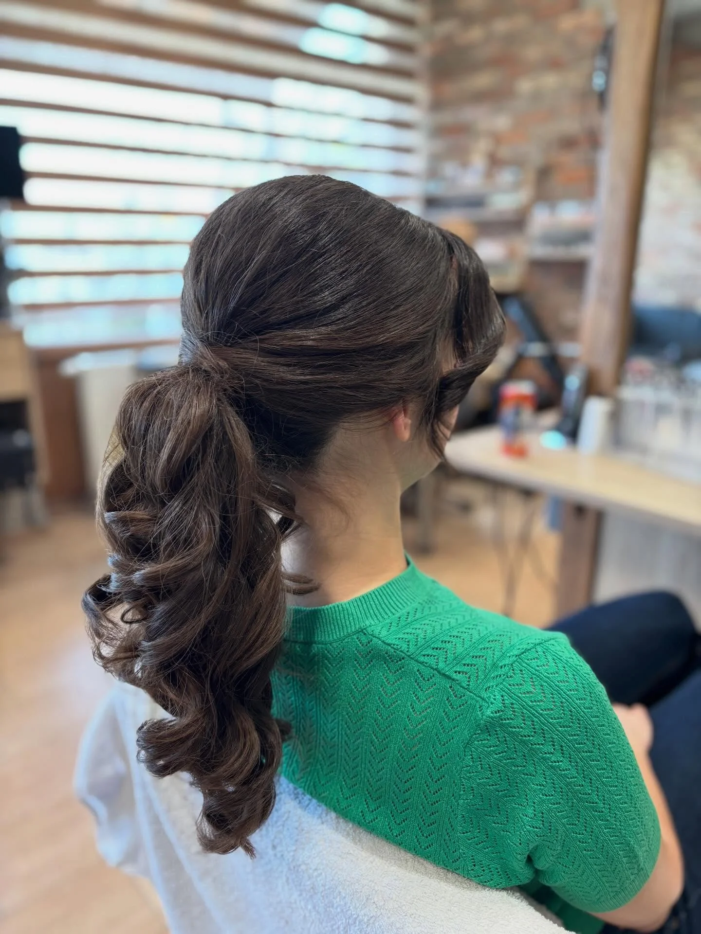 summer hairstyles ideas 2026 Low Curled Ponytail With Soft Vintage Volume