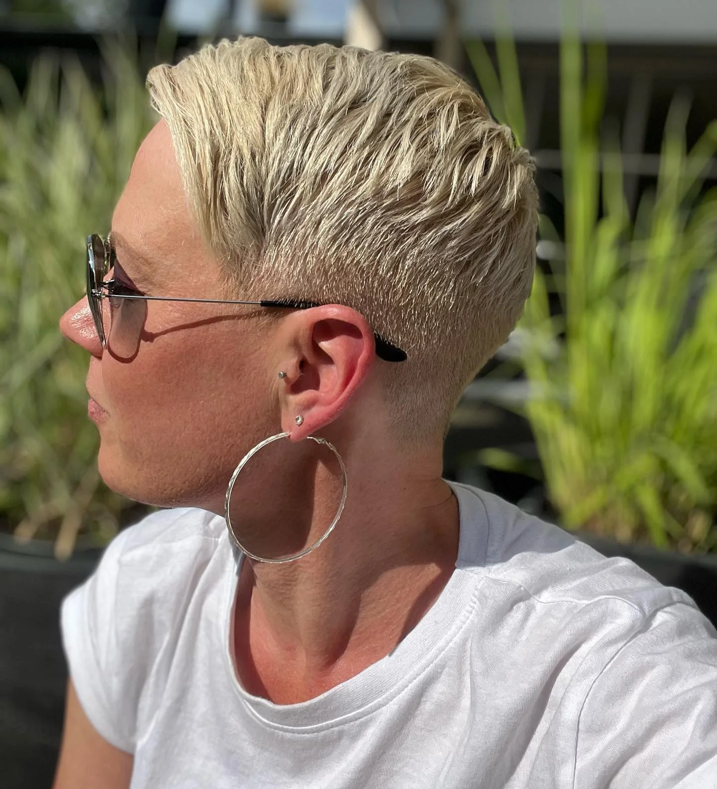 summer short haircuts 2026 Bold Undercut Pixie With Slicked Volume