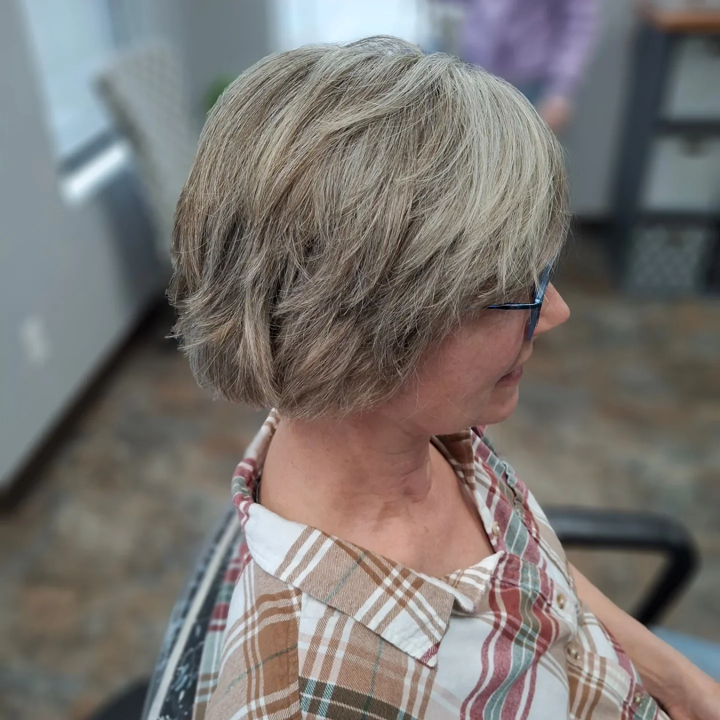 stylish summer haircuts for women over 60 2026 Textured Short Bob With Soft Bangs And Volume