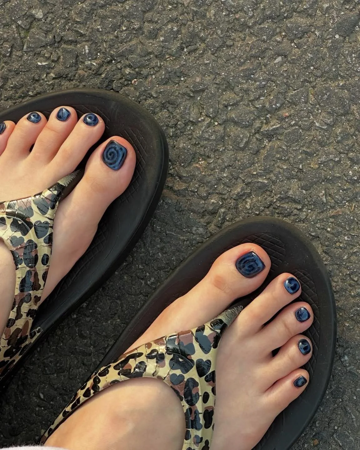 summer pedicure colors 2026 Midnight Navy Swirl Pedicure With Subtle Edge