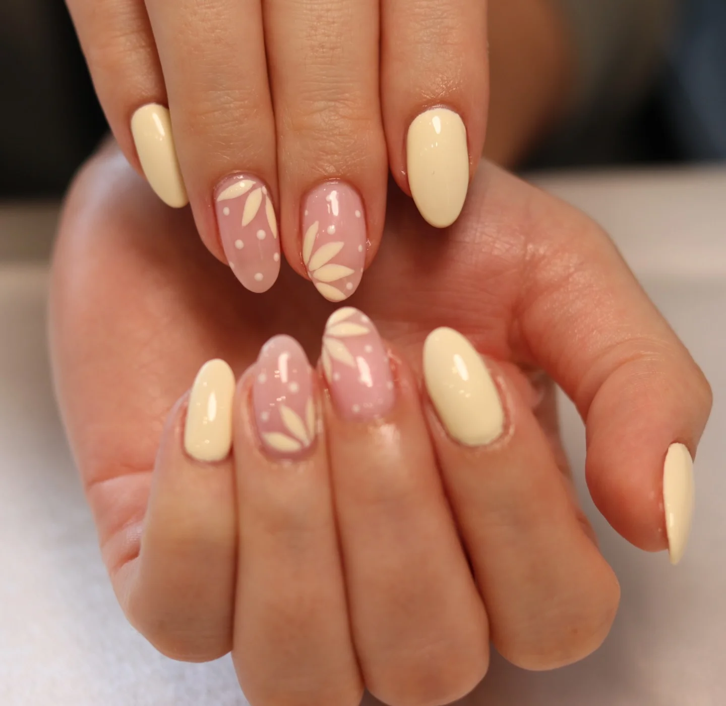 summer yellow nails 2026 Creamy Vanilla Yellow Nails With Delicate White Floral Art