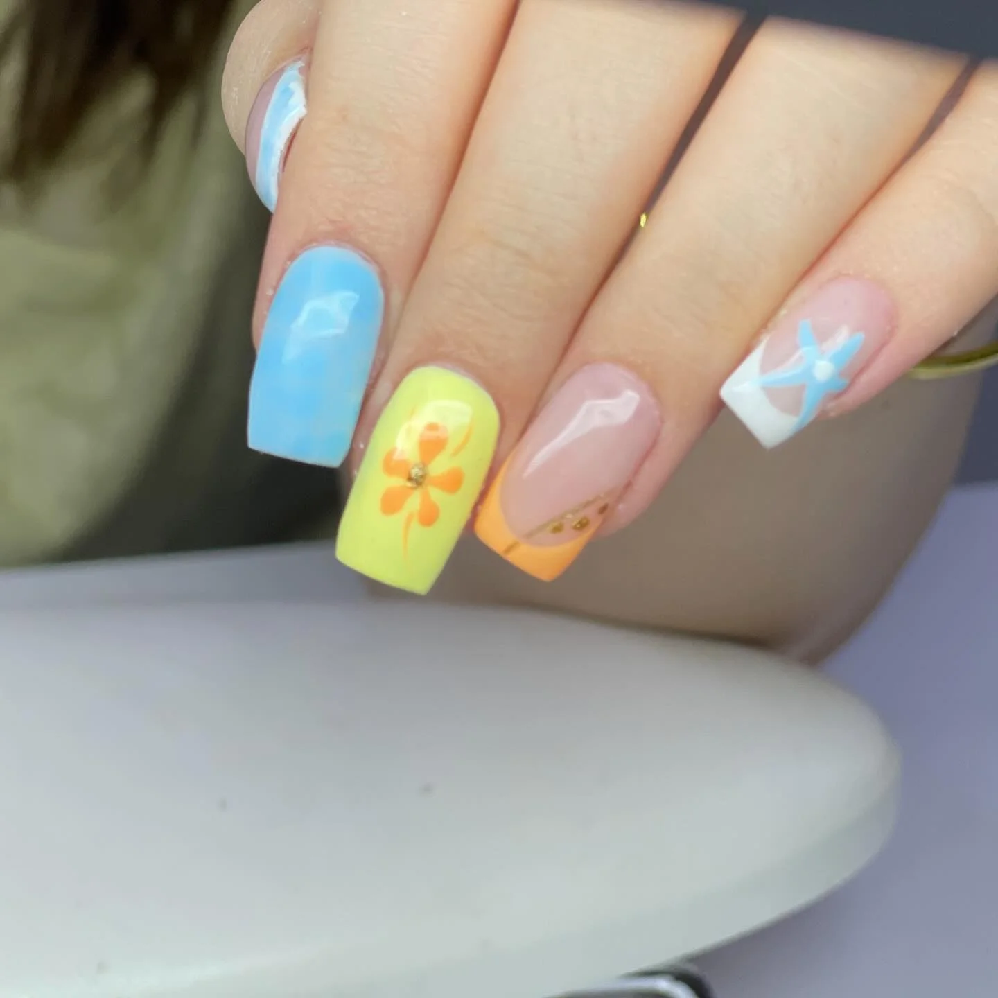 trendy summer nails 2026 Pastel Color Block Nails With Soft Retro Florals