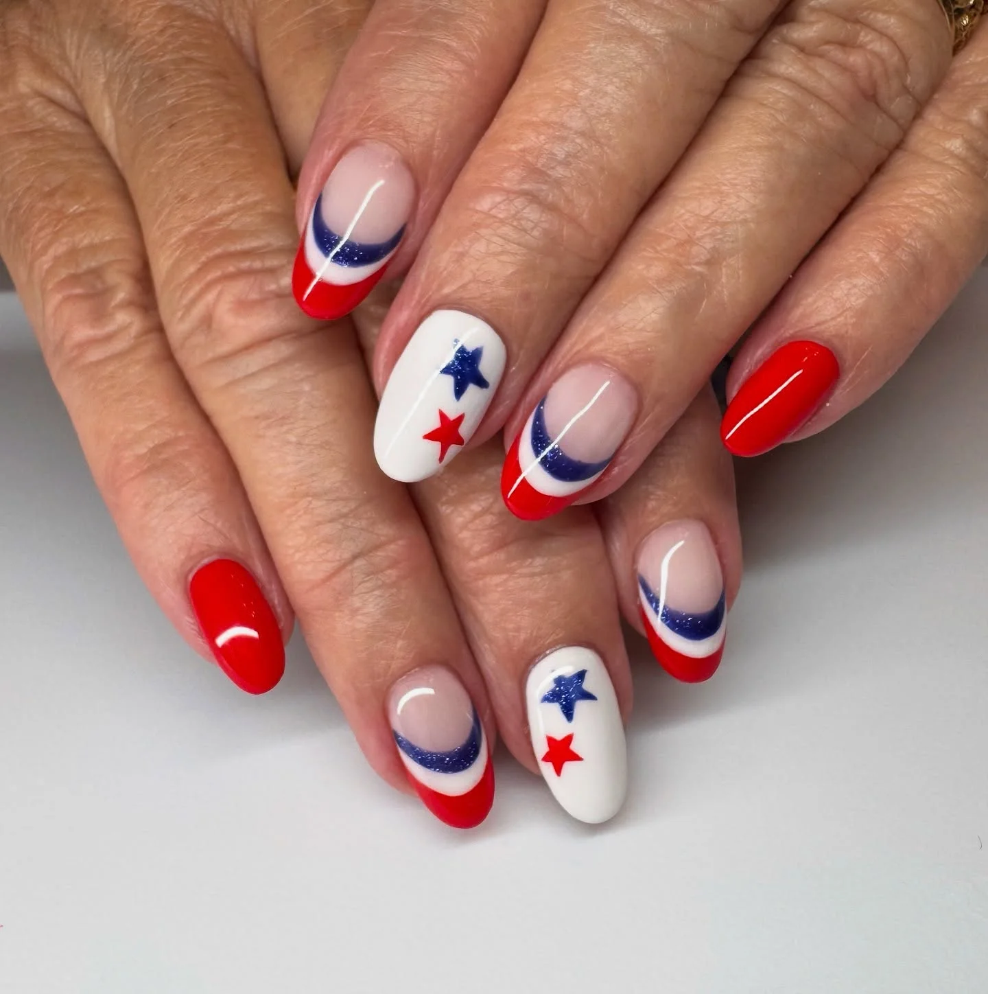usa nails 2026 Minimal Red And Blue Crescent Nails With Star Accents