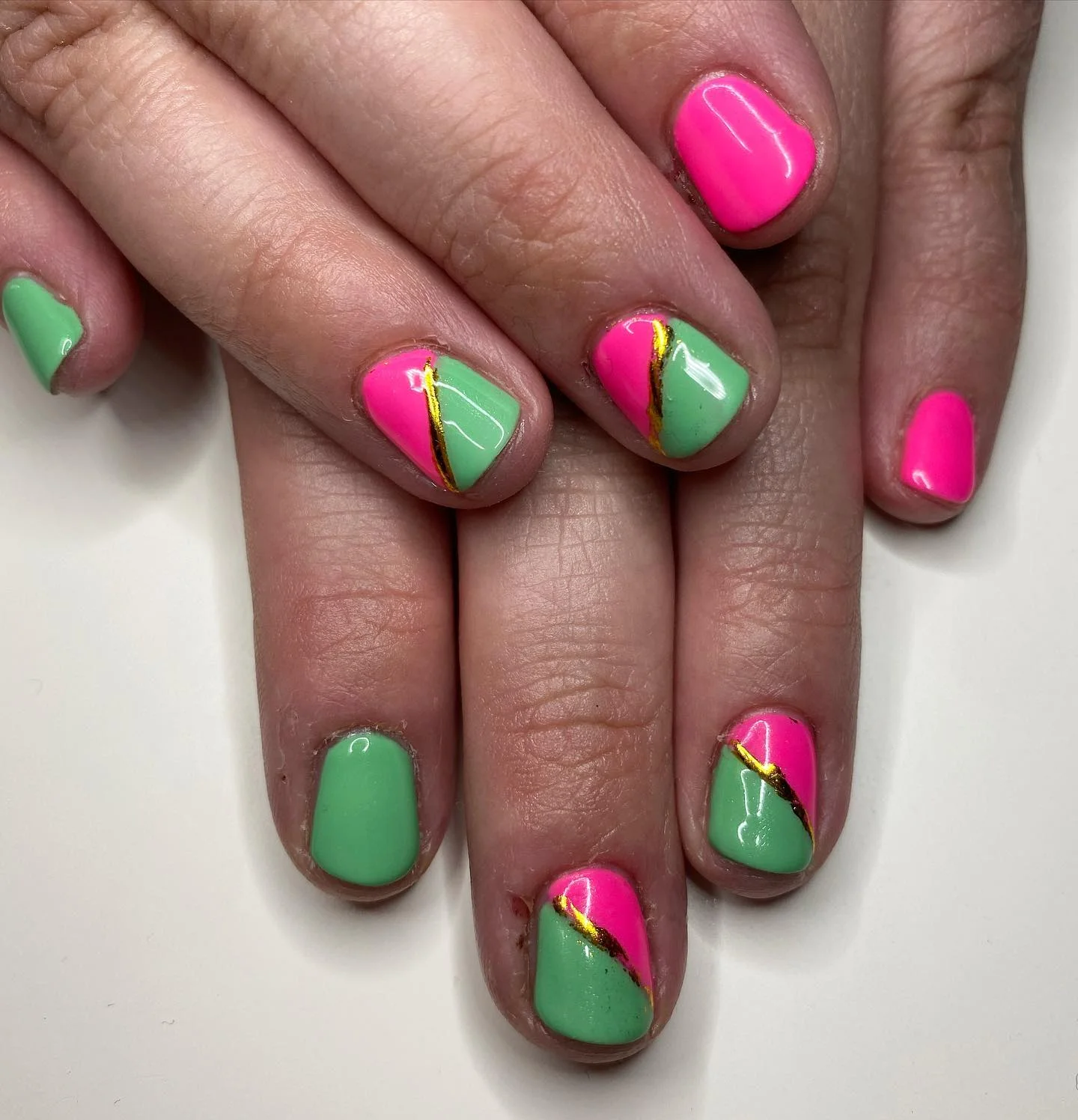 bright summer nails 2026 Neon Pink And Mint Color Clash Accent Nails