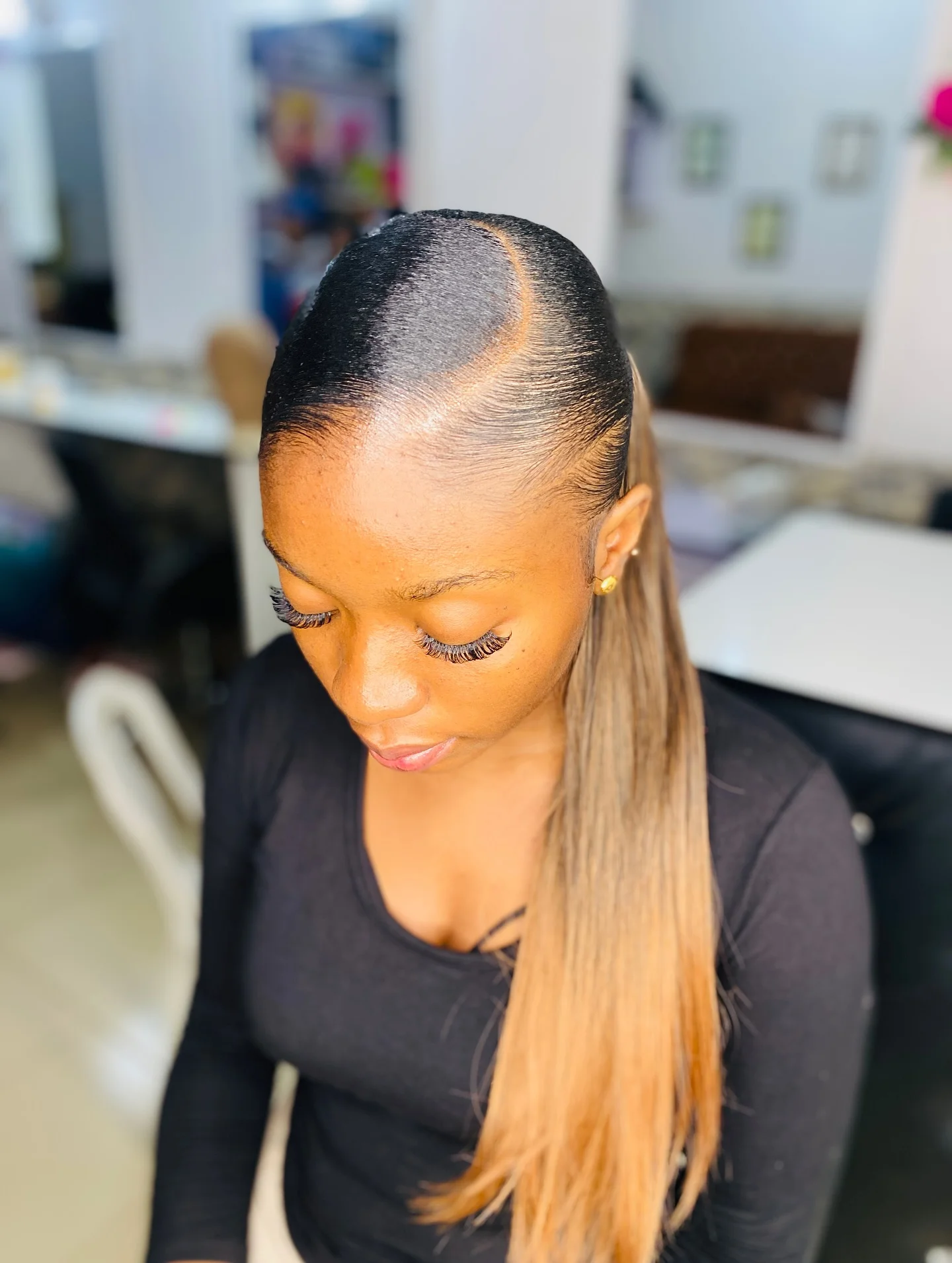 polished summer ponytail hairstyle 2026 Side-Parted Sleek Ponytail With Honey Blonde Ends