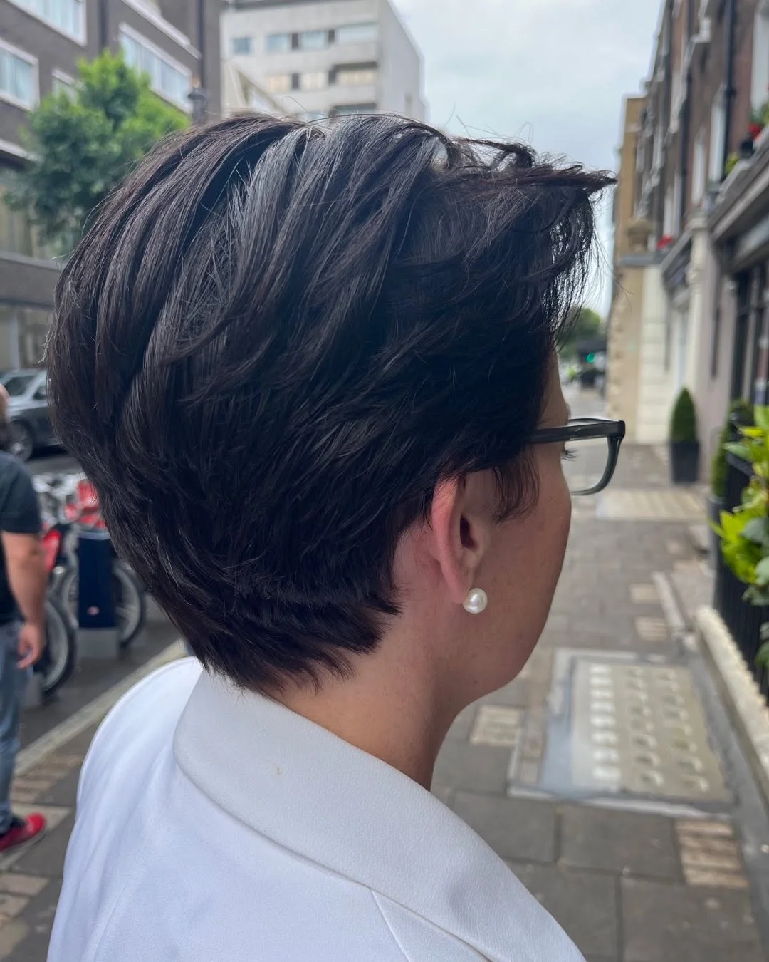summer short haircuts 2026 Layered Brunette Pixie With Natural Flow