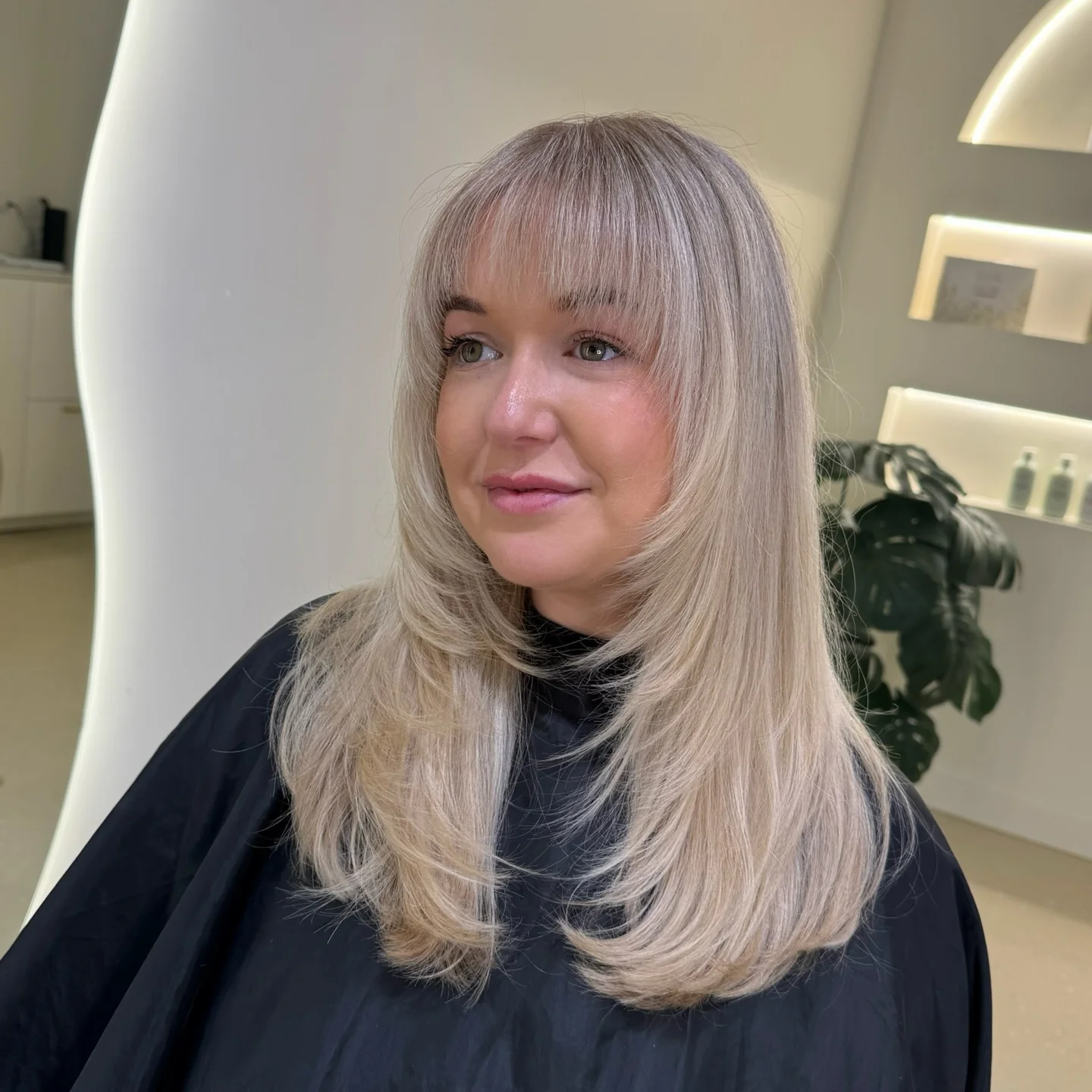 summer haircuts women over 50 Long Feathered Layers With Full Soft Bangs