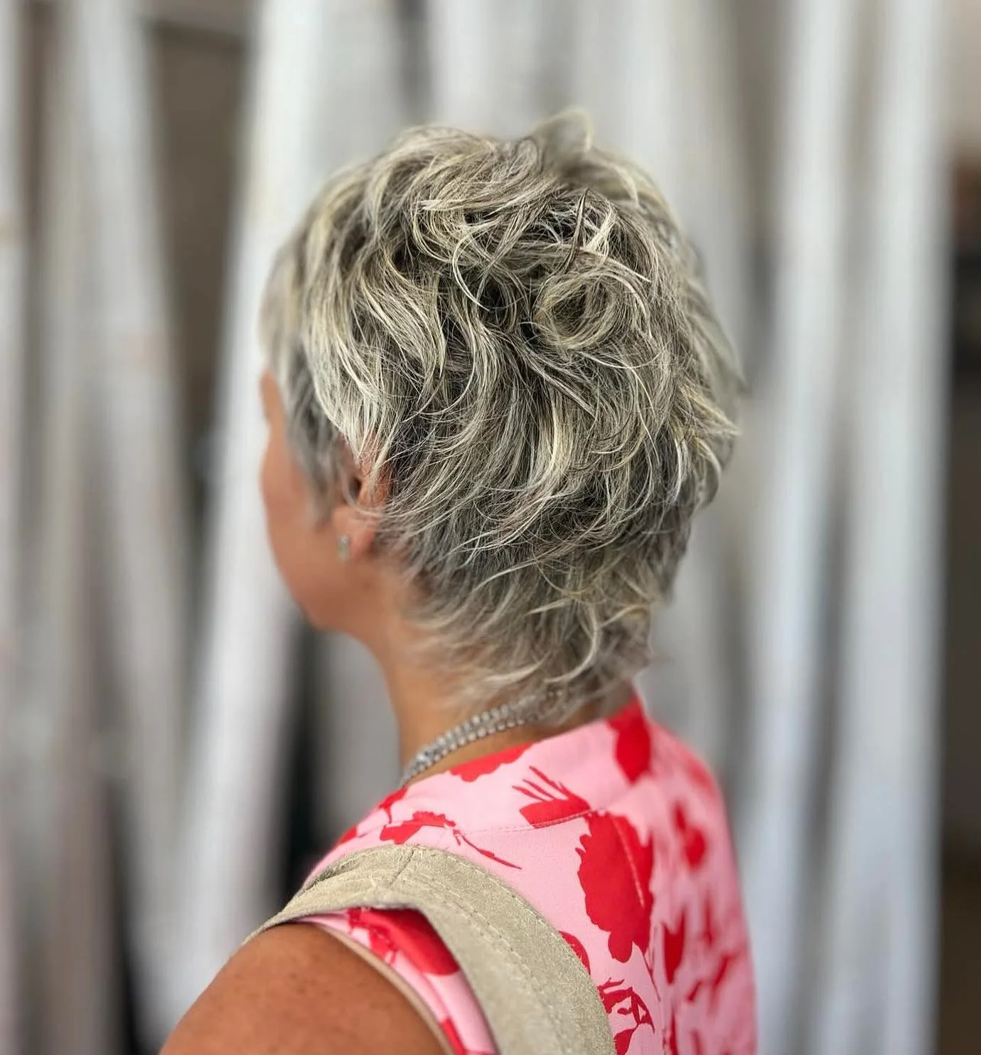 stylish summer haircuts for women over 60 2026 Short Curly Pixie With Playful Texture