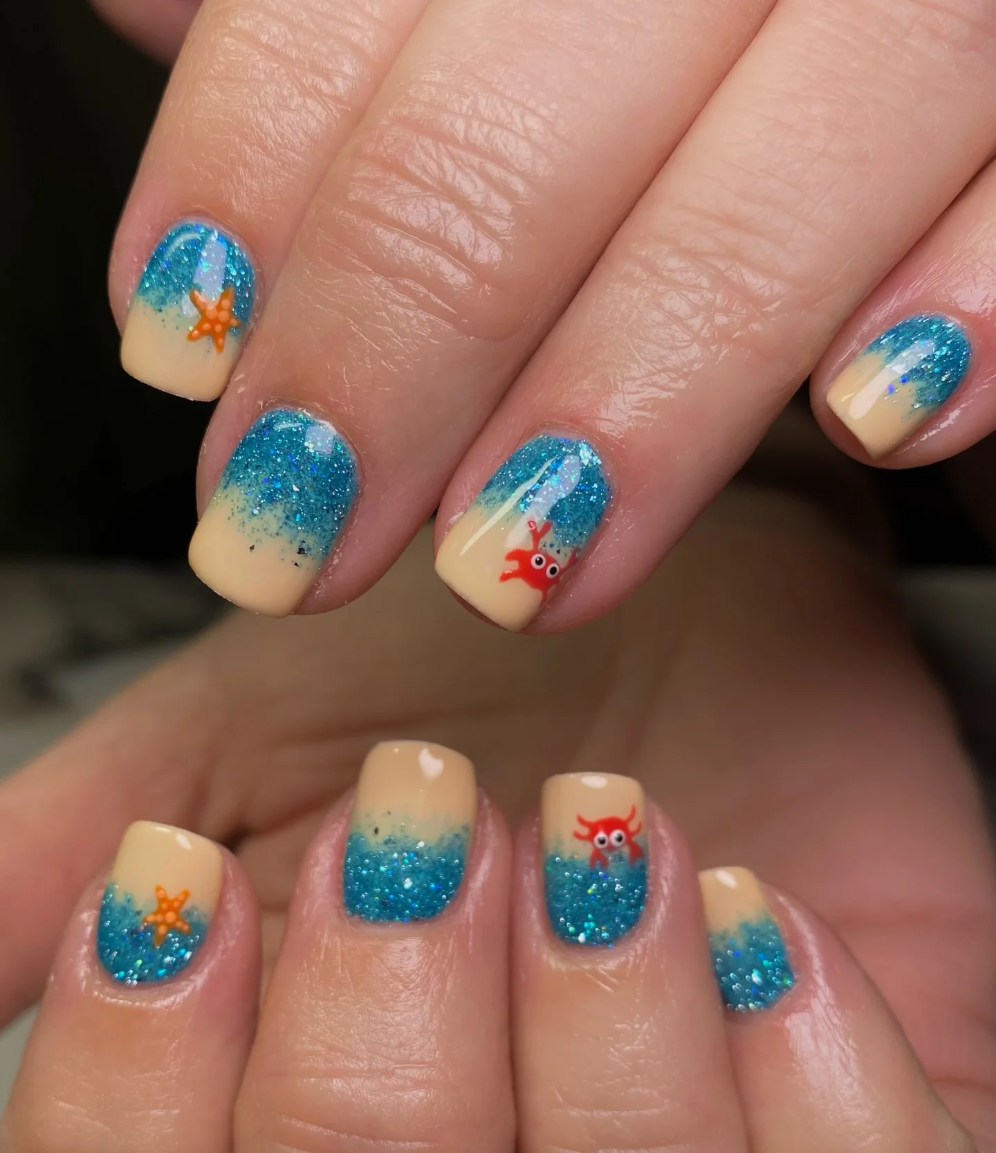 summer vacation nails 2026 Glittery Sand And Sea Short Nails
