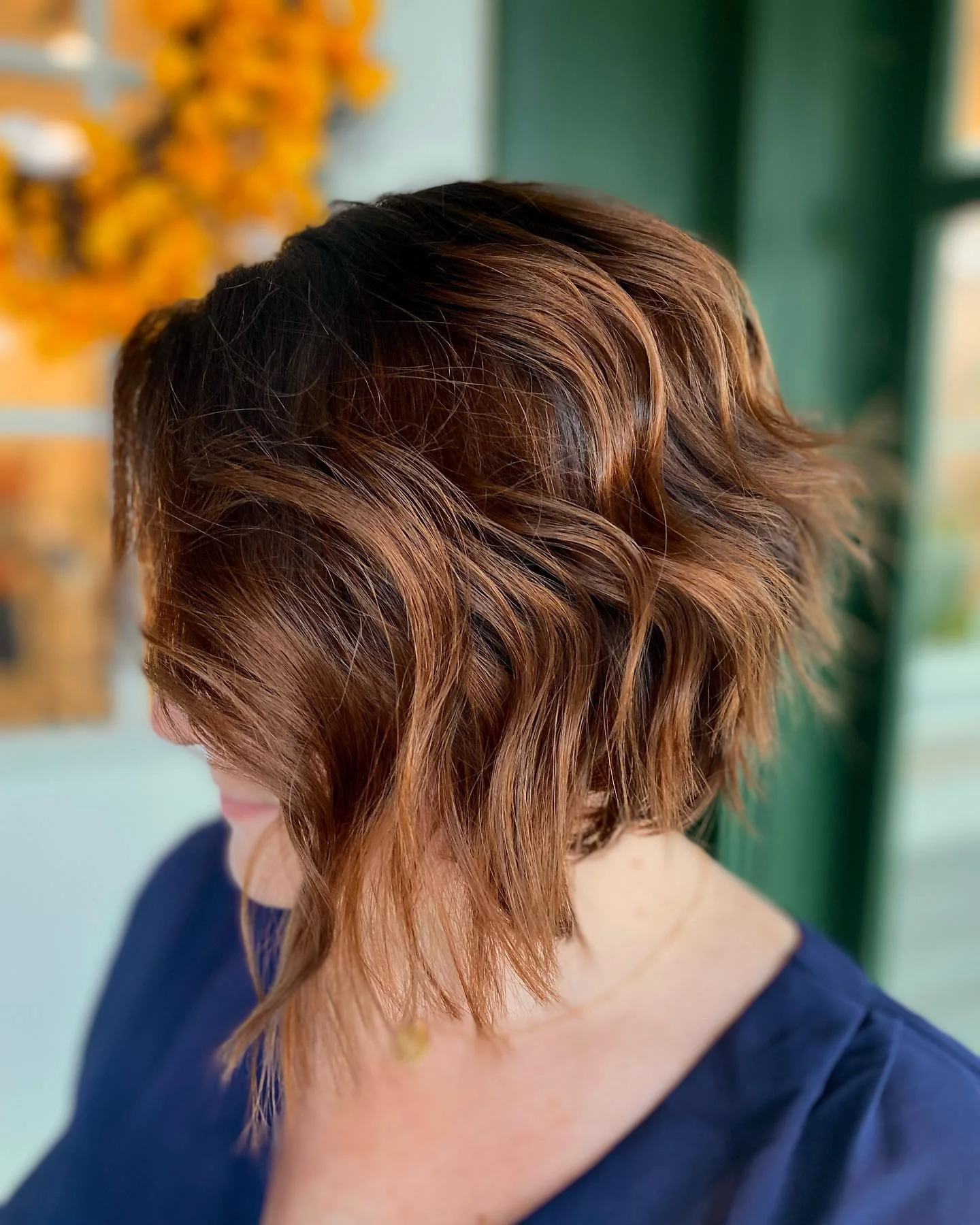 angled summer bob haircut 2026 Soft Wavy Brunette Bob With Dimensional Warmth