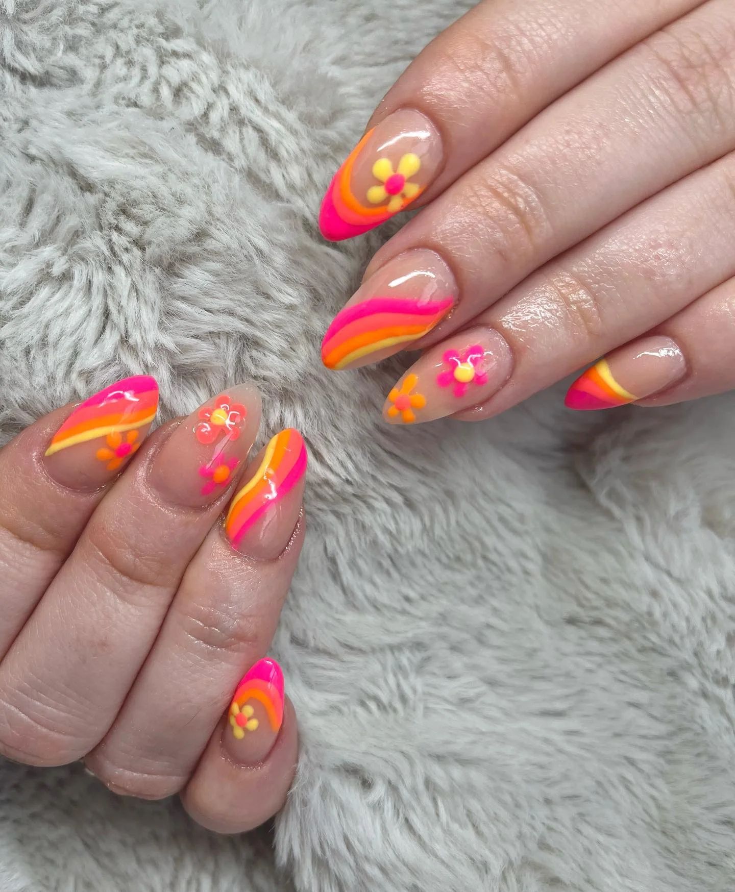 funky summer nails 2026 Groovy Floral Swirls In Neon Sunset Shades