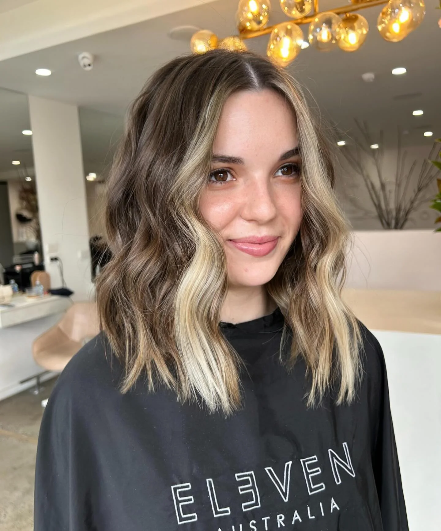 platinum summer money piece hair color 2026 Short Textured Bob With Creamy Platinum Ribbons