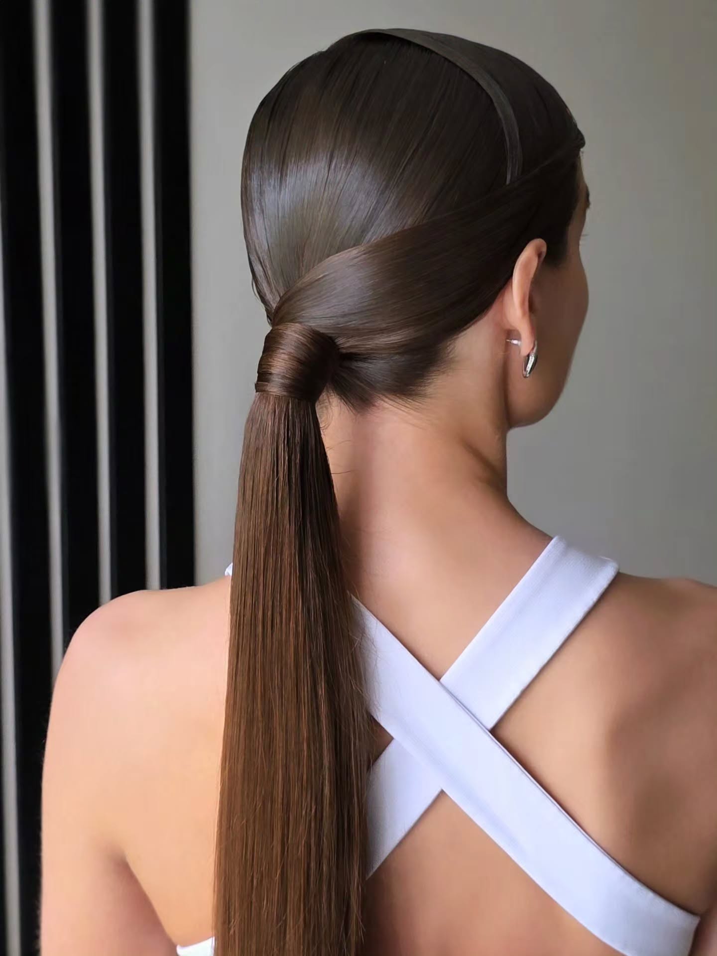 polished summer ponytail hairstyle 2026 Glass Hair Ponytail With A Wrapped Couture Finish