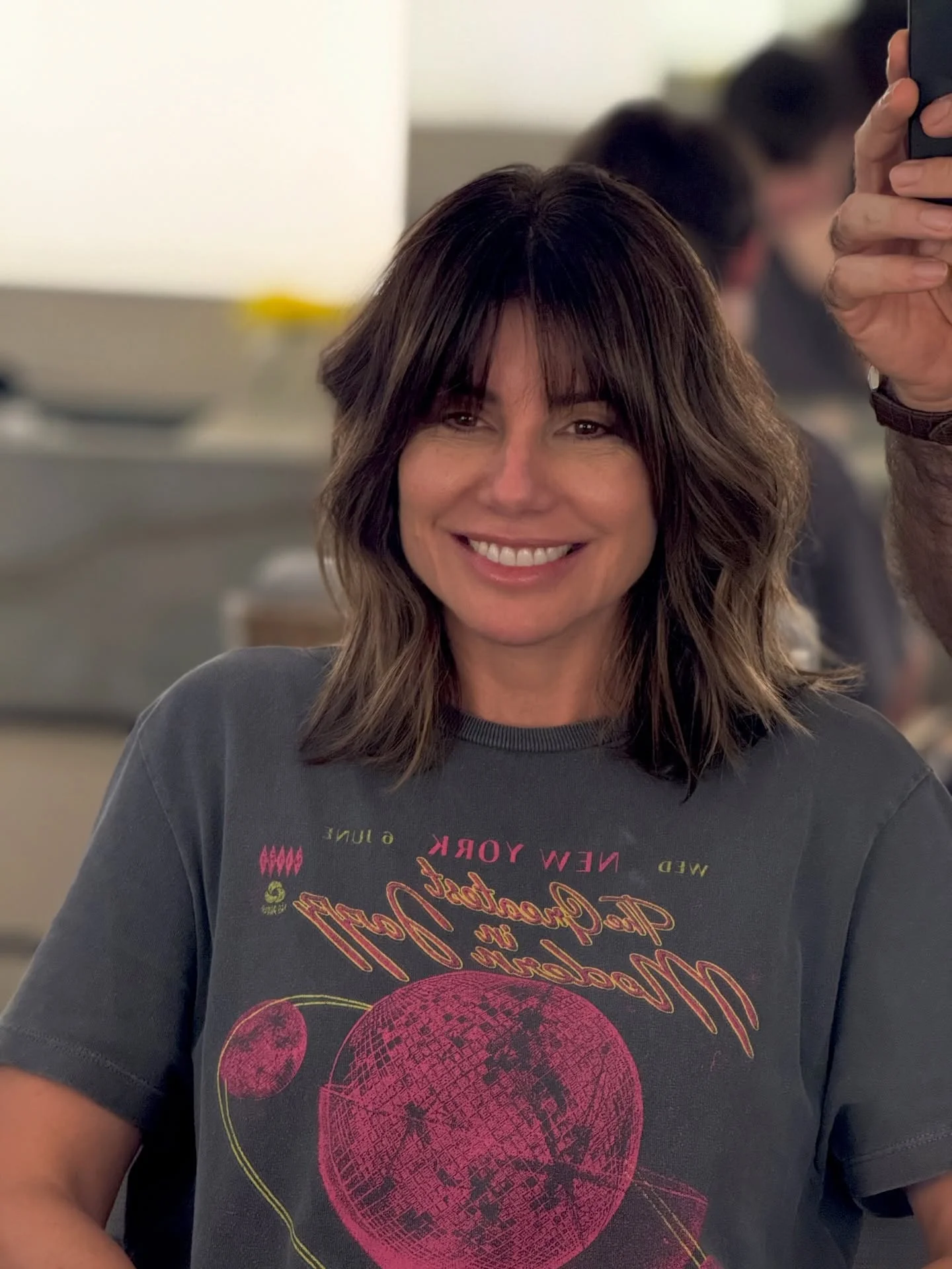 sophisticated summer haircuts for women over 40 2026 Modern Textured Lob With Curtain Bangs