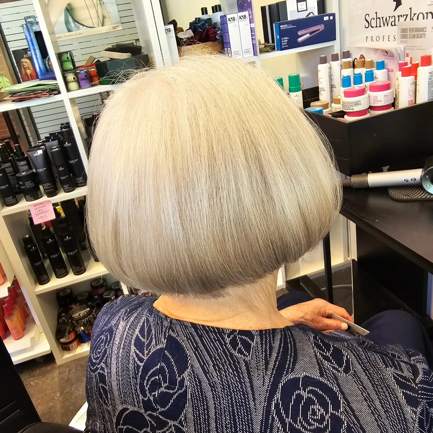 stylish summer haircuts for women over 60 2026 Precision Blunt Bob With Sleek Silver Finish