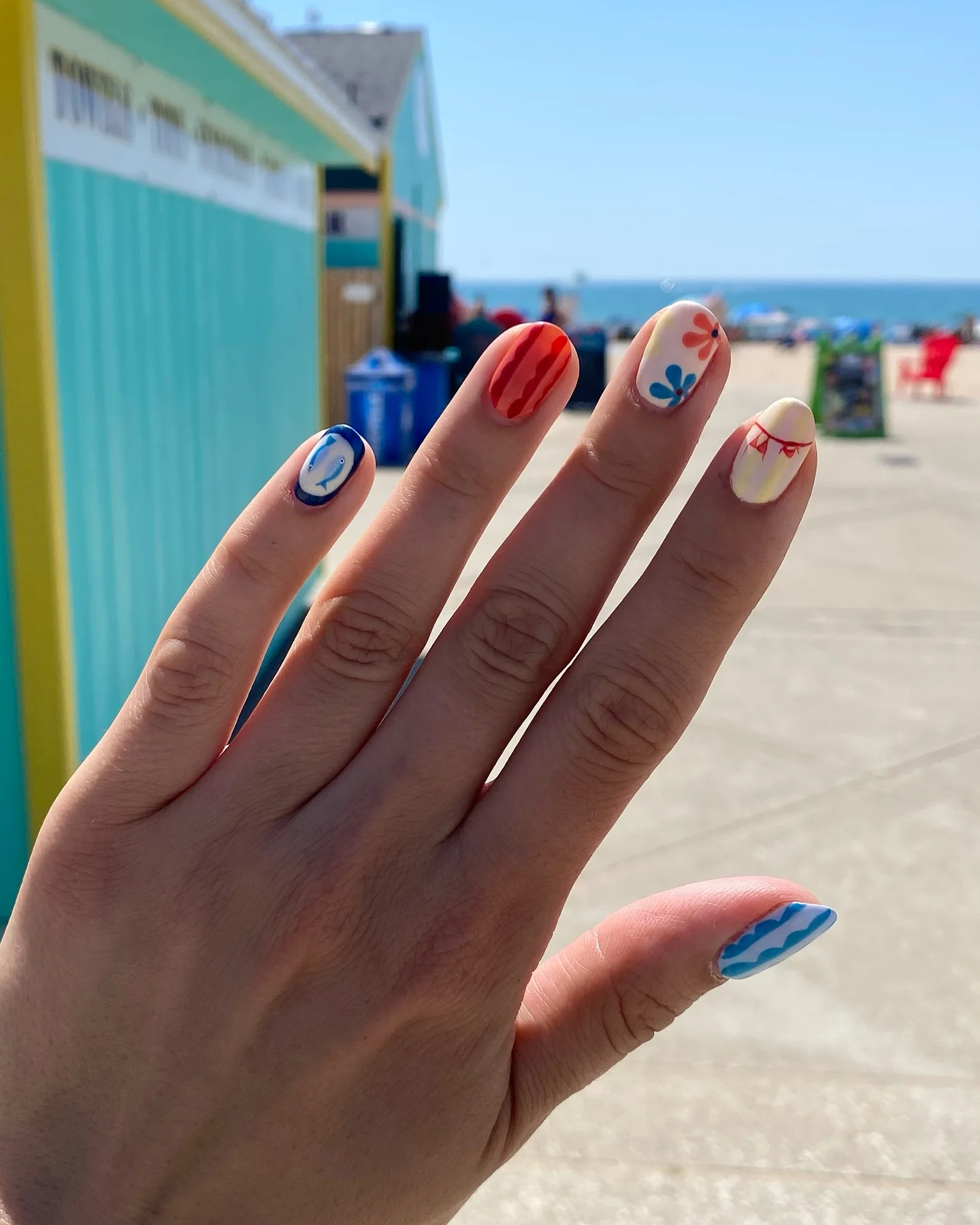 summer beach nails 2026 Retro Boardwalk Nails With Playful Seaside Art