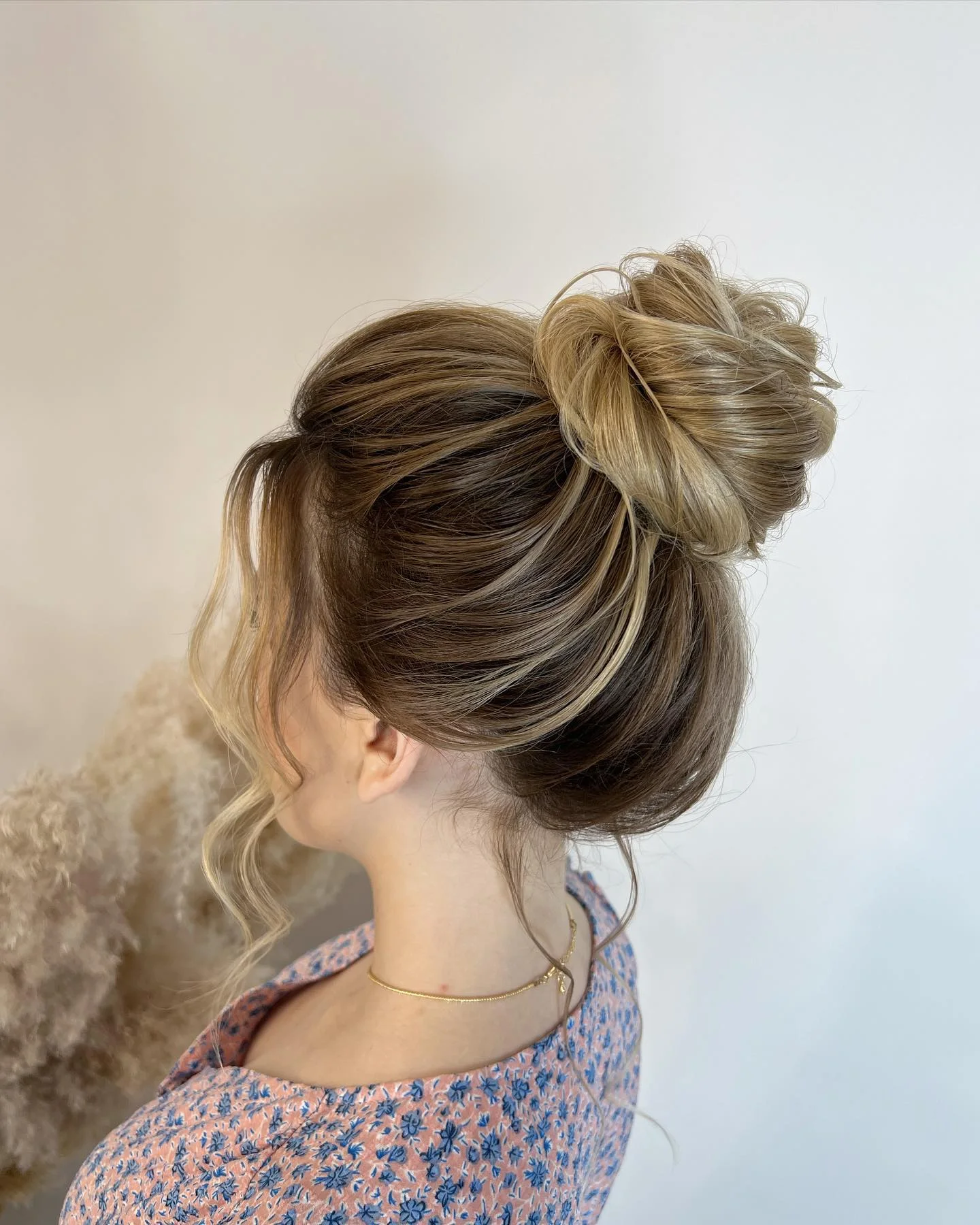 flattering summer quick hairstyles 2026 Soft Twisted Buns That Look Romantic Without Trying Too Hard