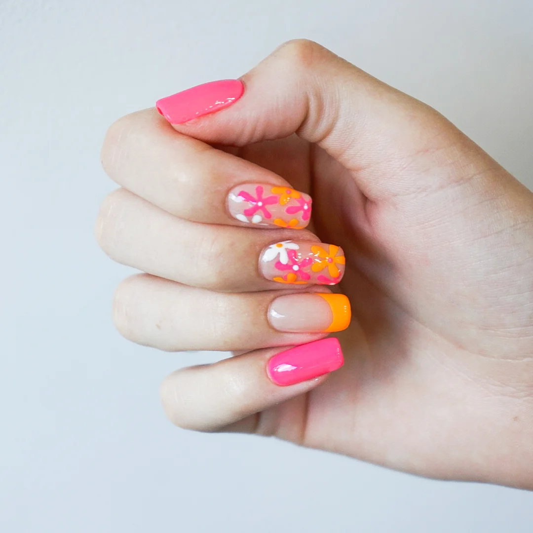 pink summer nails 2026 Retro Neon Flowers With Orange French Accents