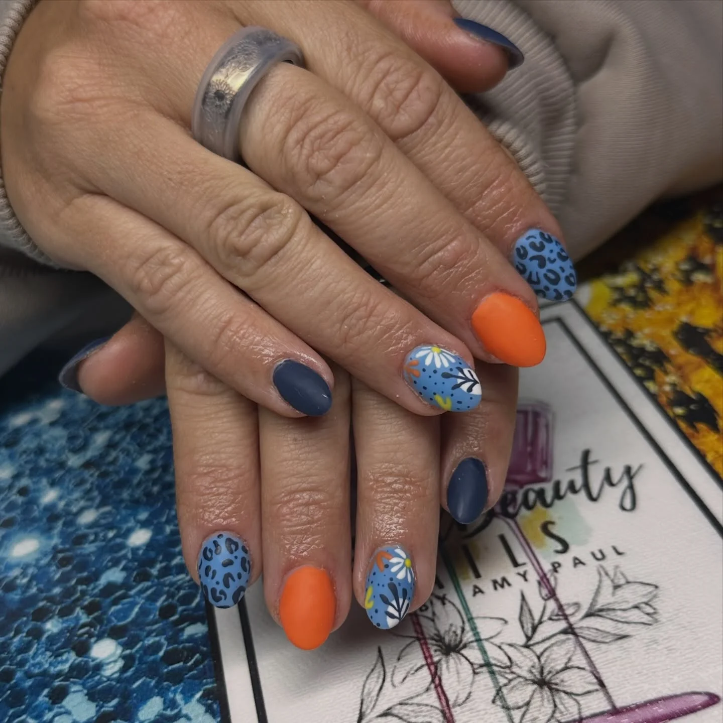 short summer nails 2026 Matte Safari Colors With Playful Leopard Accents