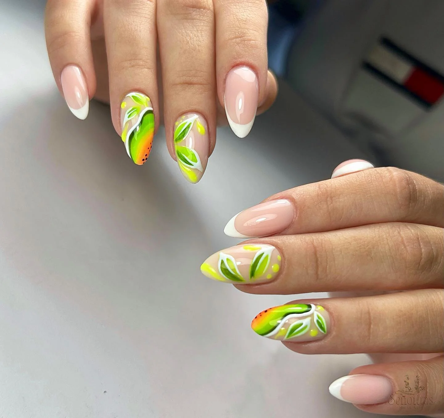 summer nails design 2026 Kiwi French Tips With Neon Botanical Details