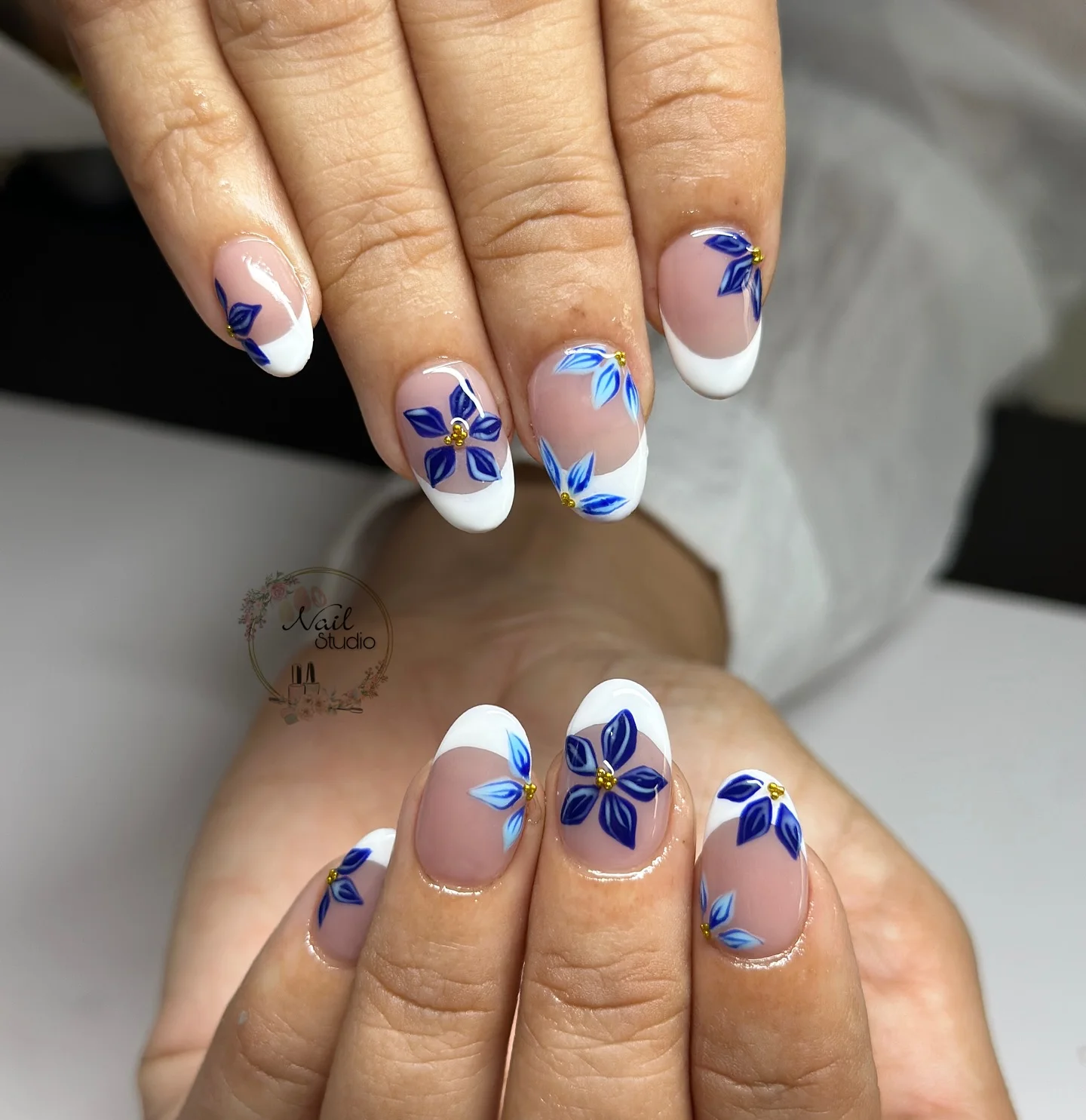 summer vacation nails 2026 Blue Floral French Vacation Nails