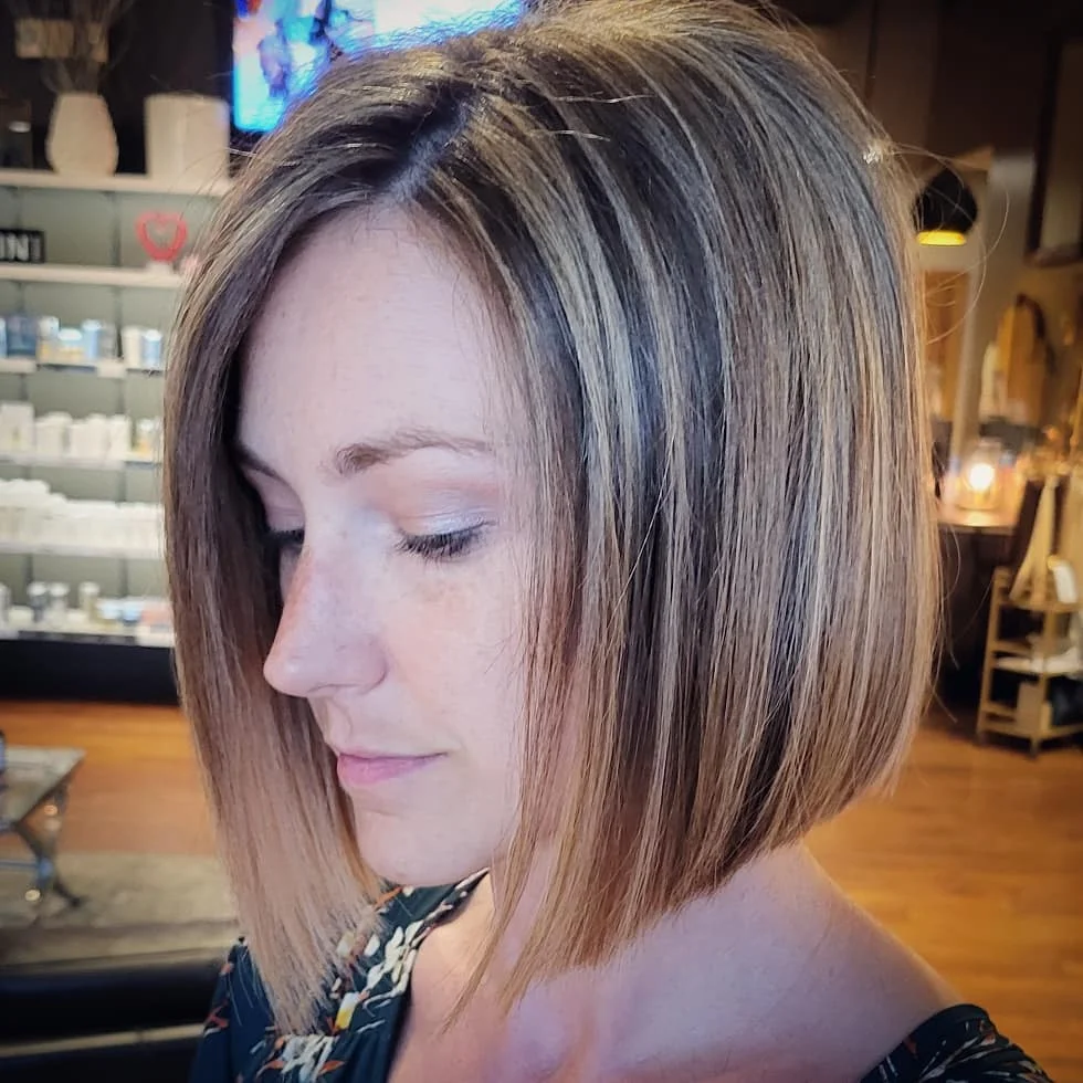 angled summer bob haircut 2026 Soft Highlighted Angle With Natural Side Flow