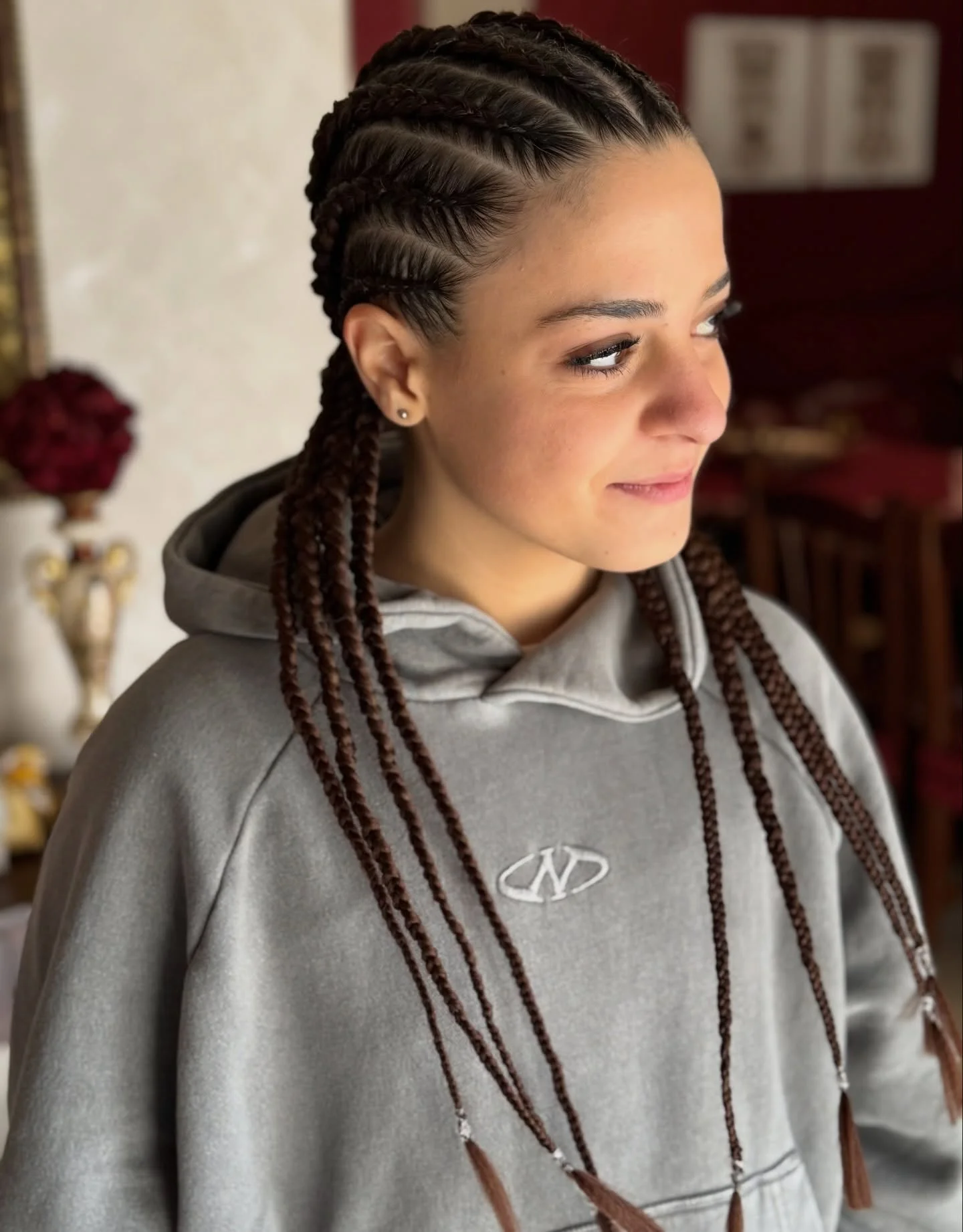 natural summer braids hairstyle 2026 Sleek Micro Braids With Sporty Summer Energy